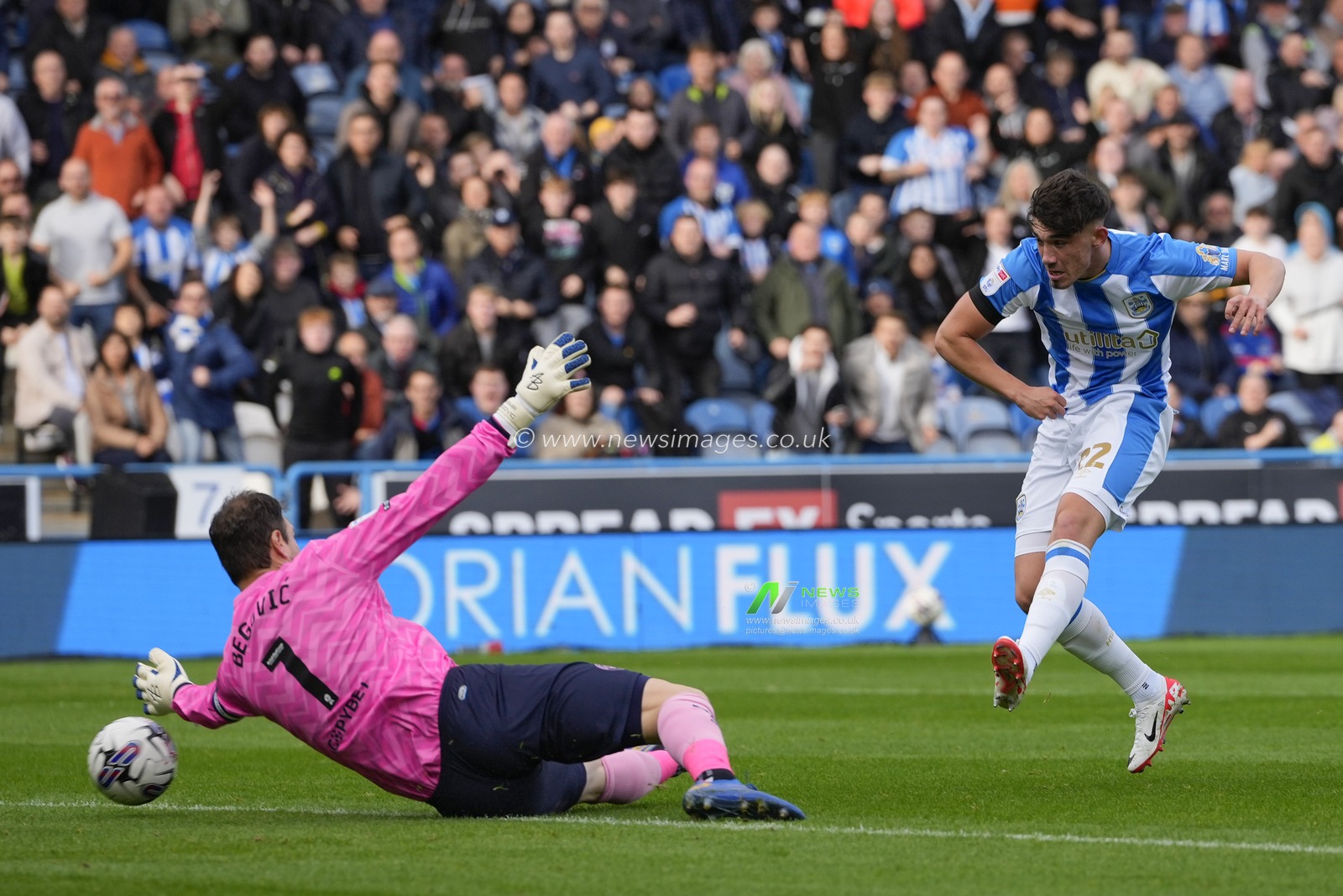 Kian Harratt #22 of Huddersfield Town scores a goal to make it 1-0 during the Sky Bet Championship match Huddersfield Town vs Queens Park Rangers at John Smith's Stadium, Huddersfield, United Kingdom, 21st October 2023

(Photo by Steve Flynn/News Images)
