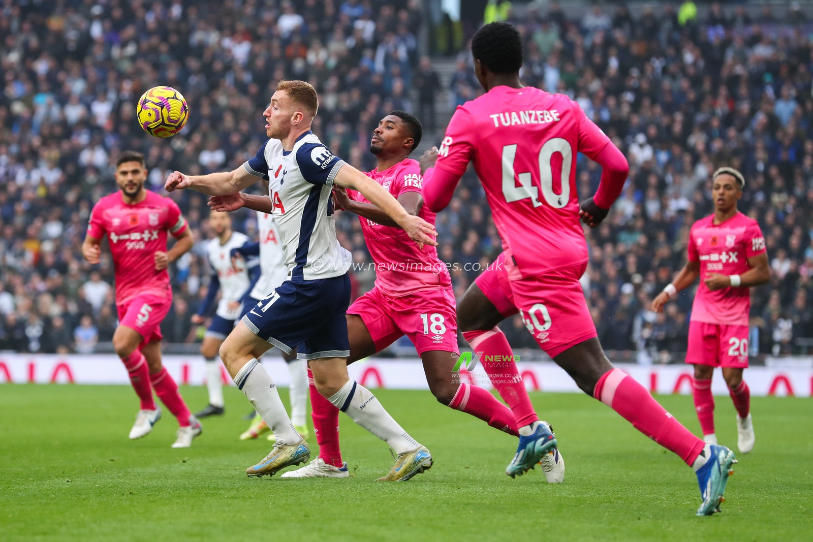 Dejan Kulusevski of Tottenham Hotspur is put under pressure by Ben Johnson of Ipswich Town during the Premier League match Tottenham Hotspur vs Ipswich Town at Tottenham Hotspur Stadium, London, United Kingdom, 10th November 2024

(Photo by Izzy Poles/News Images)