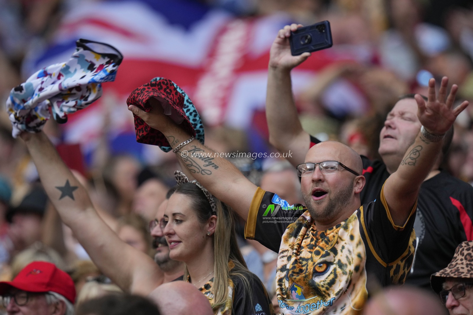Jubilant Leigh Leopards fans after the Betfred Challenge Cup match Hull KR vs Leigh Leopards at Wembley Stadium, London, United Kingdom, 12th August 2023

(Photo by Steve Flynn/News Images)
