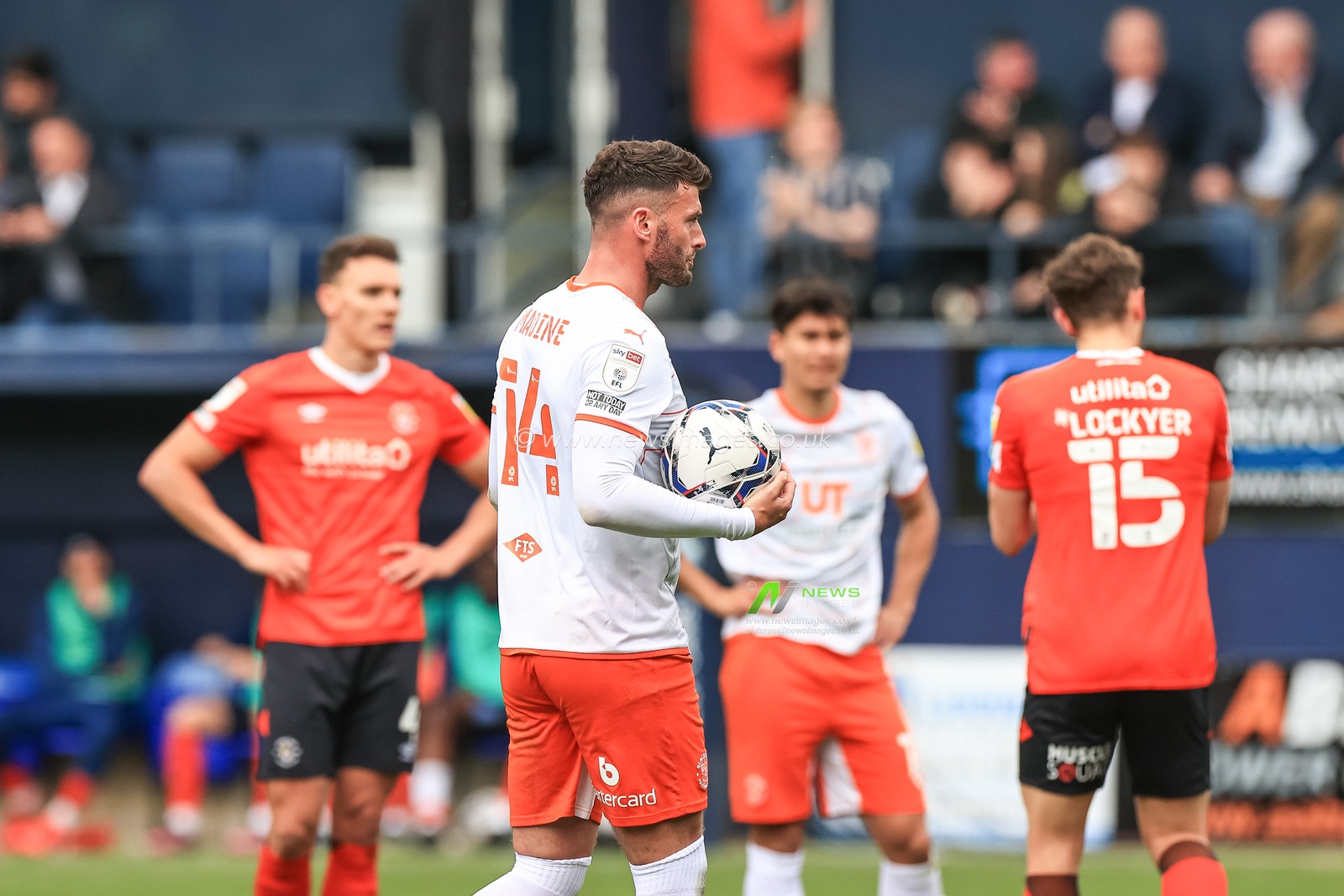 Gary Madine #14 of Blackpool heads to the penalty spot