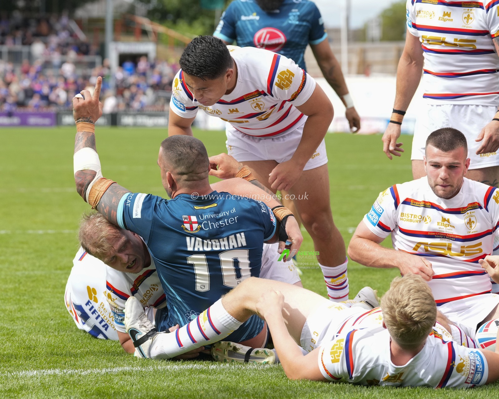 Paul Vaughan #10 of Warrington Wolves celebrates after scoring a try during the Betfred Super League Round 20 match Wakefield Trinity vs Warrington Wolves at The Be Well Support Stadium, Wakefield, United Kingdom, 30th July 2023

(Photo by Steve Flynn/News Images)