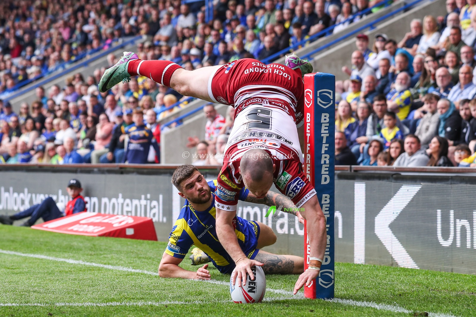 Liam Marshall of Wigan Warriors goes over for a try and makes the score 12-10 during the Betfred Super League Round 13 match Warrington Wolves vs Wigan Warriors at Halliwell Jones Stadium, Warrington, United Kingdom, 1st June 2024

(Photo by Gareth Evans/News Images)