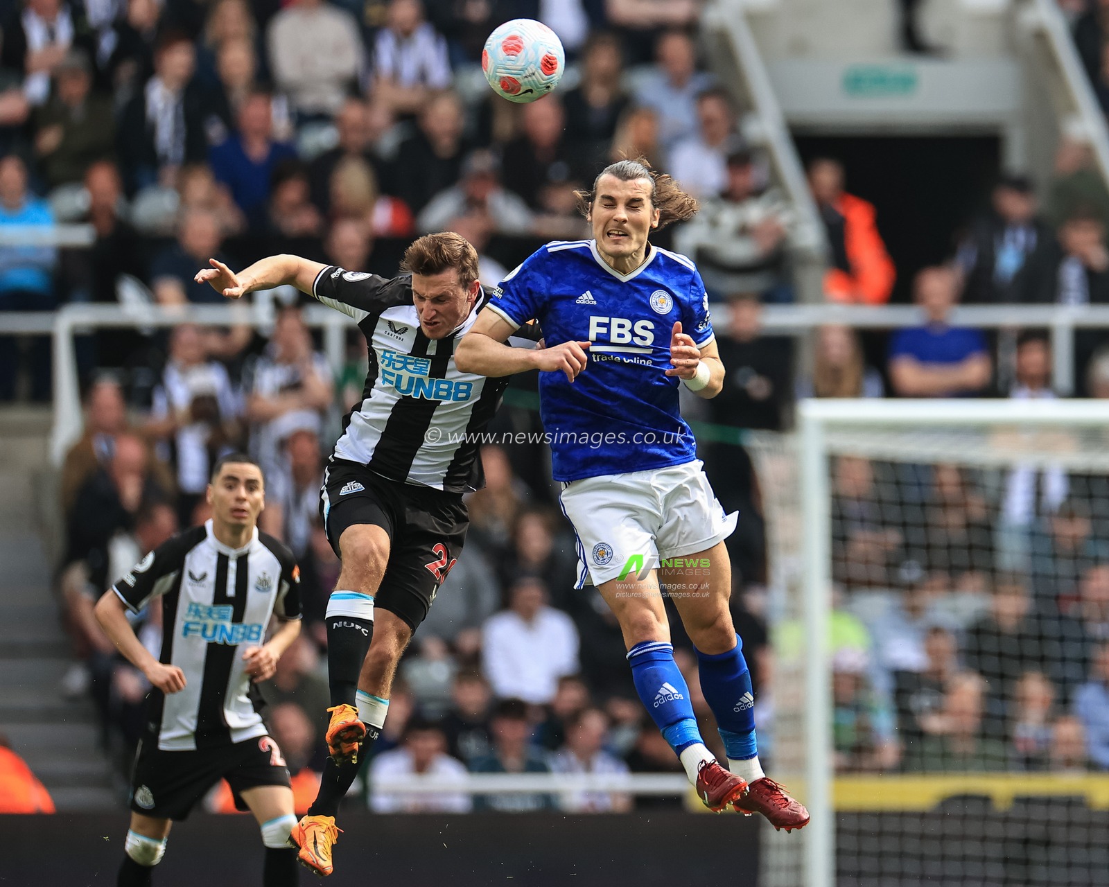 Chris Wood #20 of Newcastle United and Ã‡aglar Soyuncu #4 of Leicester City battle for the ball