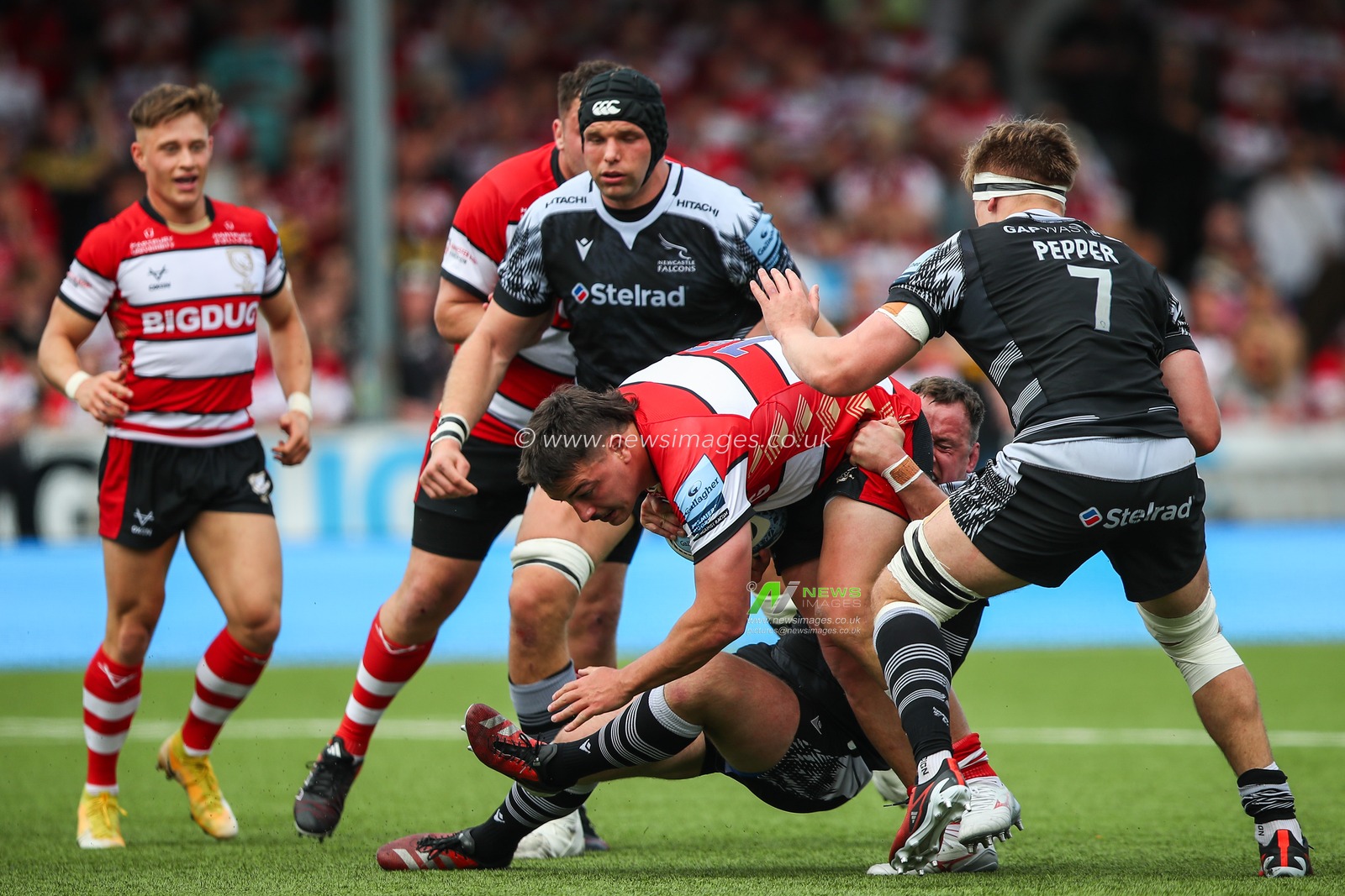 Santi Socino of Gloucester Rugby is tackled during the Gallagher Premiership match Gloucester Rugby vs Newcastle Falcons at Kingsholm Stadium , Gloucester, United Kingdom, 18th May 2024

(Photo by Gareth Evans/News Images)