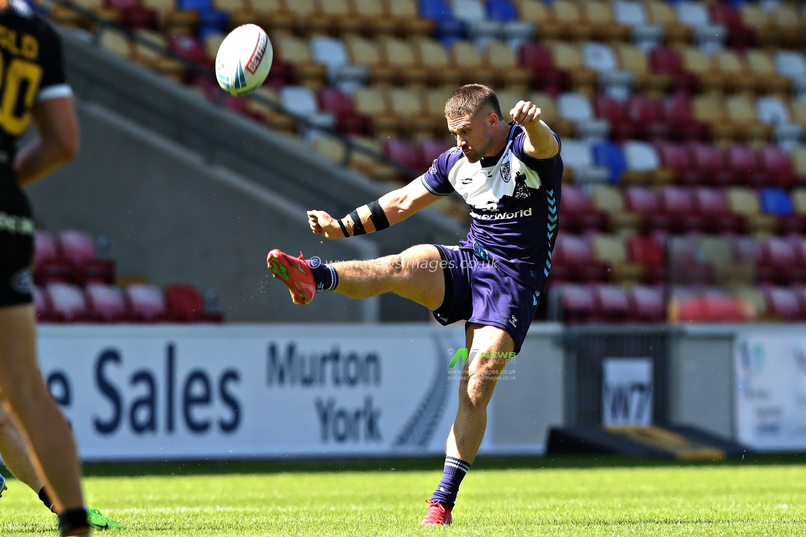 Ryan Hampshire of Featherstone Rovers kicks during the Betfred Championship match York City Knights vs Featherstone Rovers at LNER Community Stadium, York, United Kingdom, 29th June 2025(Photo by Sam Eaden/News Images)