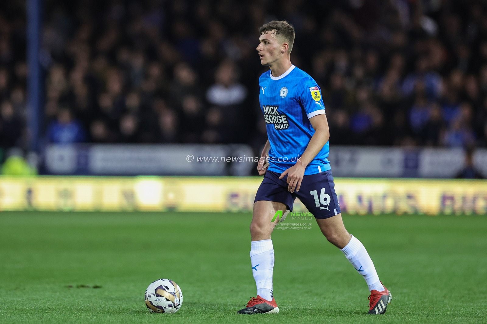 Harrison Burrows #16 of Peterborough United with the ball during the Sky Bet League 1 Play-Offs match Peterborough vs Sheffield Wednesday at Weston Homes Stadium, Peterborough, United Kingdom, 12th May 2023

(Photo by Mark Cosgrove/News Images)