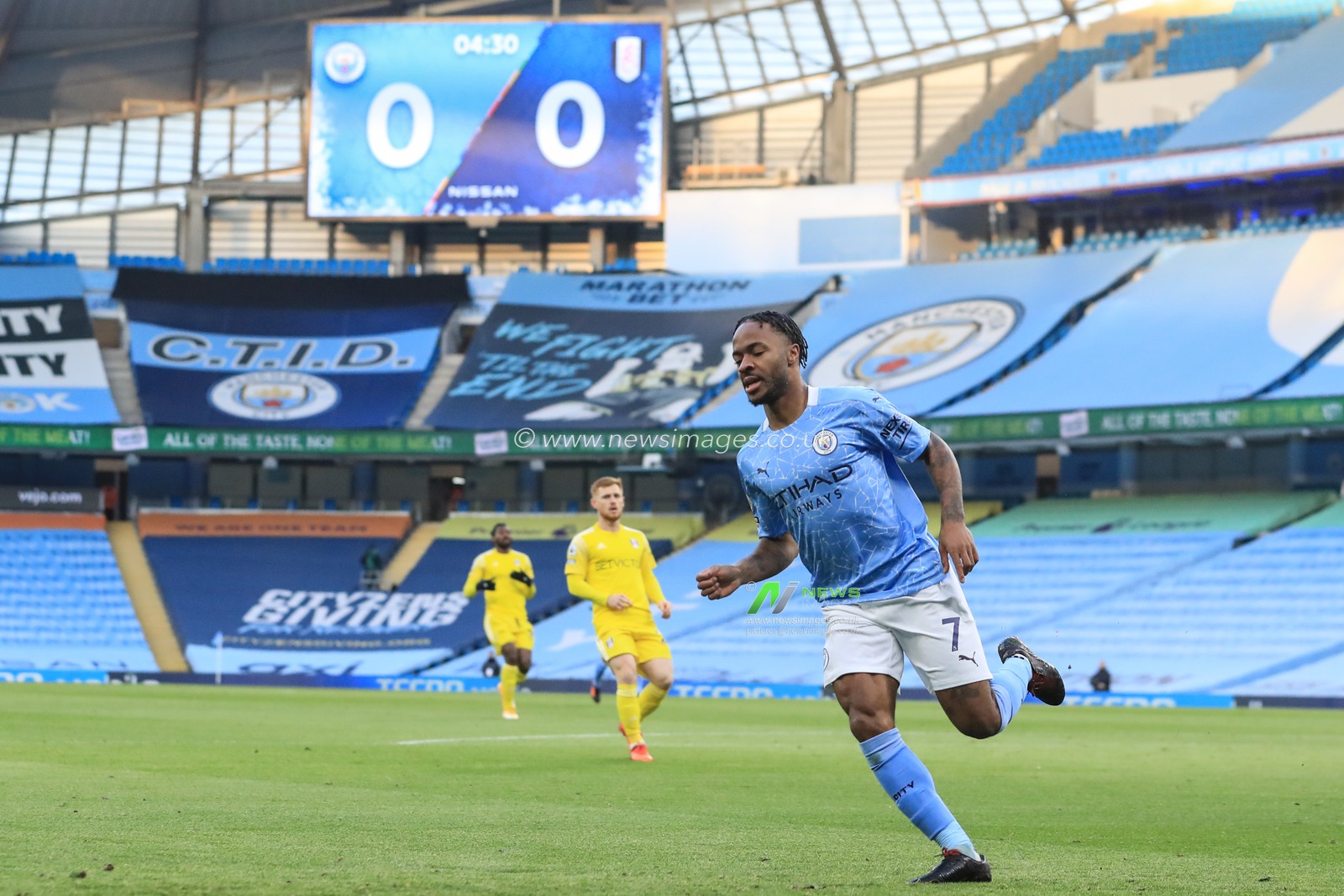 Raheem Sterling #7 of Manchester City celebrates his goal to make it 0-1