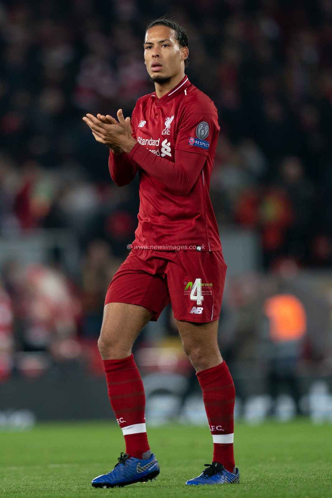 Liverpool's Virgil van Dijk applaudes the fans at the end of the match

9th April 2019 , Anfield Stadium, Liverpool, England;  EUFA Champions League Quarter Final, First Leg, Liverpool FC vs FC Porto 

Credit: Terry Donnelly/News Images