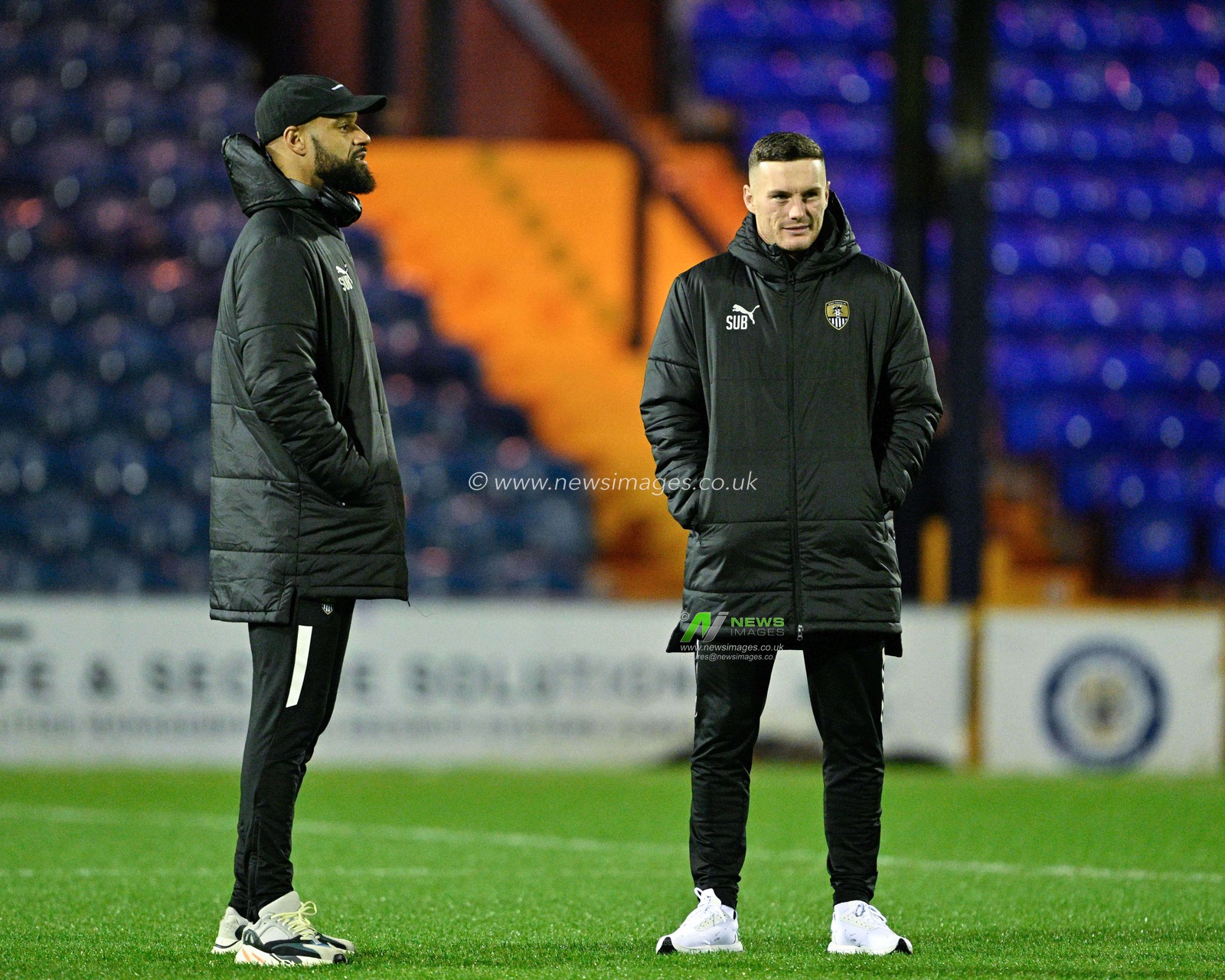 David McGoldrick 17# of Notts County Football Club and Macaulay Langstaff 9# of Notts County Football Club share a joke as they inspects the pitch ahead of the match, during the Sky Bet League 2 match Stockport County vs Notts County at Edgeley Park Stadium, Stockport, United Kingdom, 22nd December 2023

(Photo by Cody Froggatt/News Images)