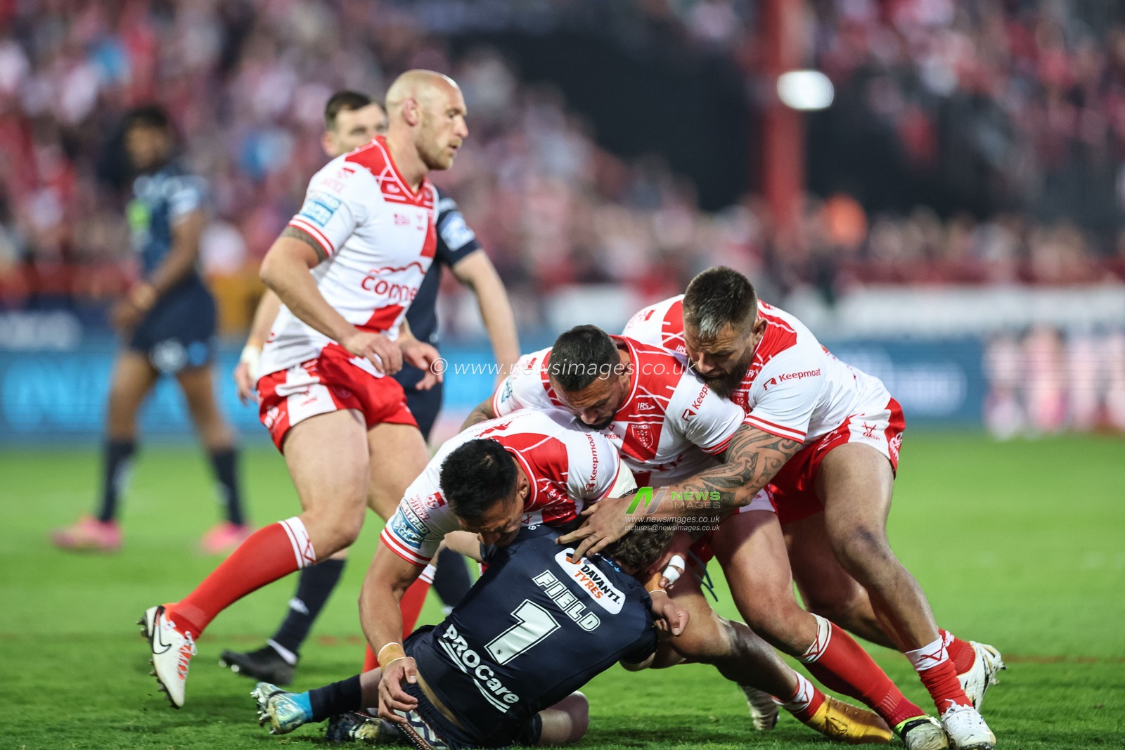 Jai Field of Wigan Warriors is tackled by Sauaso Sue of Hull KR during the Betfred Super League Round 7 match Hull KR vs Wigan Warriors at Sewell Group Craven Park, Kingston upon Hull, United Kingdom, 11th April 2025

(Photo by Mark Cosgrove/News Images)