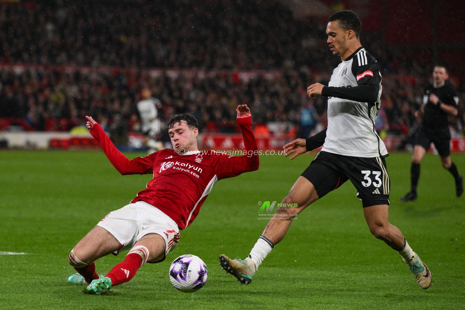 Antonee Robinson of Fulham is tackled by Neco Williams of Nottingham Forest during the Premier League match Nottingham Forest vs Fulham at City Ground, Nottingham, United Kingdom, 2nd April 2024

(Photo by Craig Thomas/News Images)