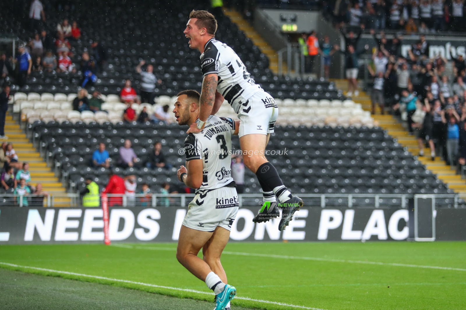 Jamie Shaul (29) of Hull FC celebrates Carlos Tuimavave (3) of Hull FC try which was later disallowed in front of the Hull KR fans