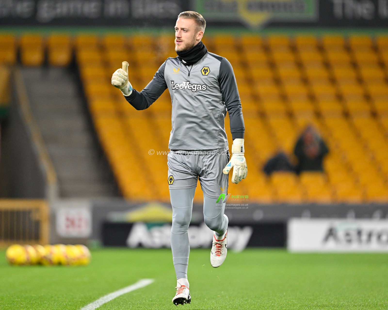 Daniel Bentley of Wolverhampton Wanderers gives fans the thumbs up as he warms up ahead of the match, during the Emirates FA Cup Third Round Replay match Wolverhampton Wanderers vs Brentford at Molineux, Wolverhampton, United Kingdom, 16th January 2024

(Photo by Cody Froggatt/News Images)