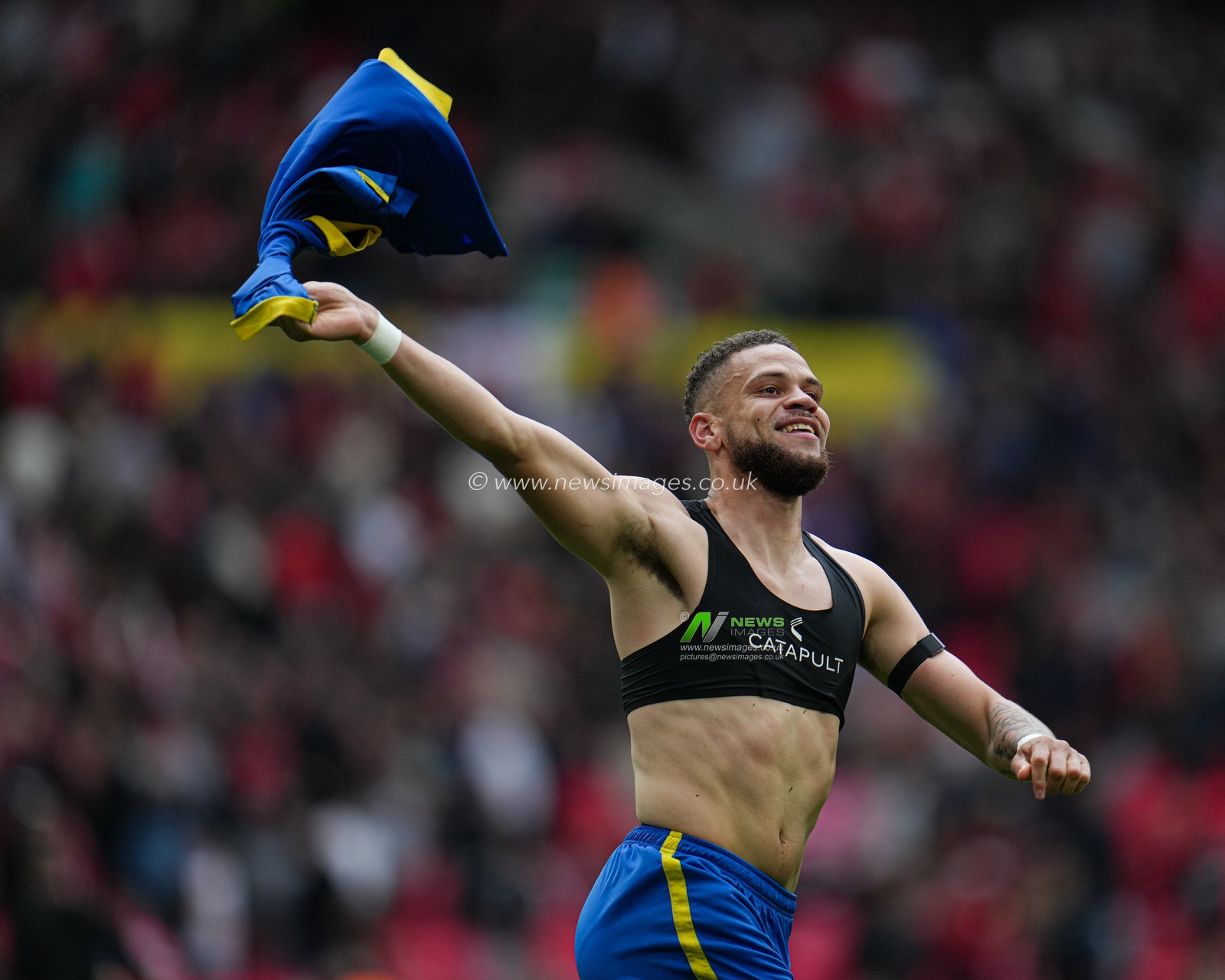 Marcus Browne of AFC Wimbledon celebrates play off win during the Sky Bet League 2 Playoff Final match AFC Wimbledon vs Walsall at Wembley Stadium, London, United Kingdom, 26th May 2025

(Photo by Harvey Murphy/News Images)