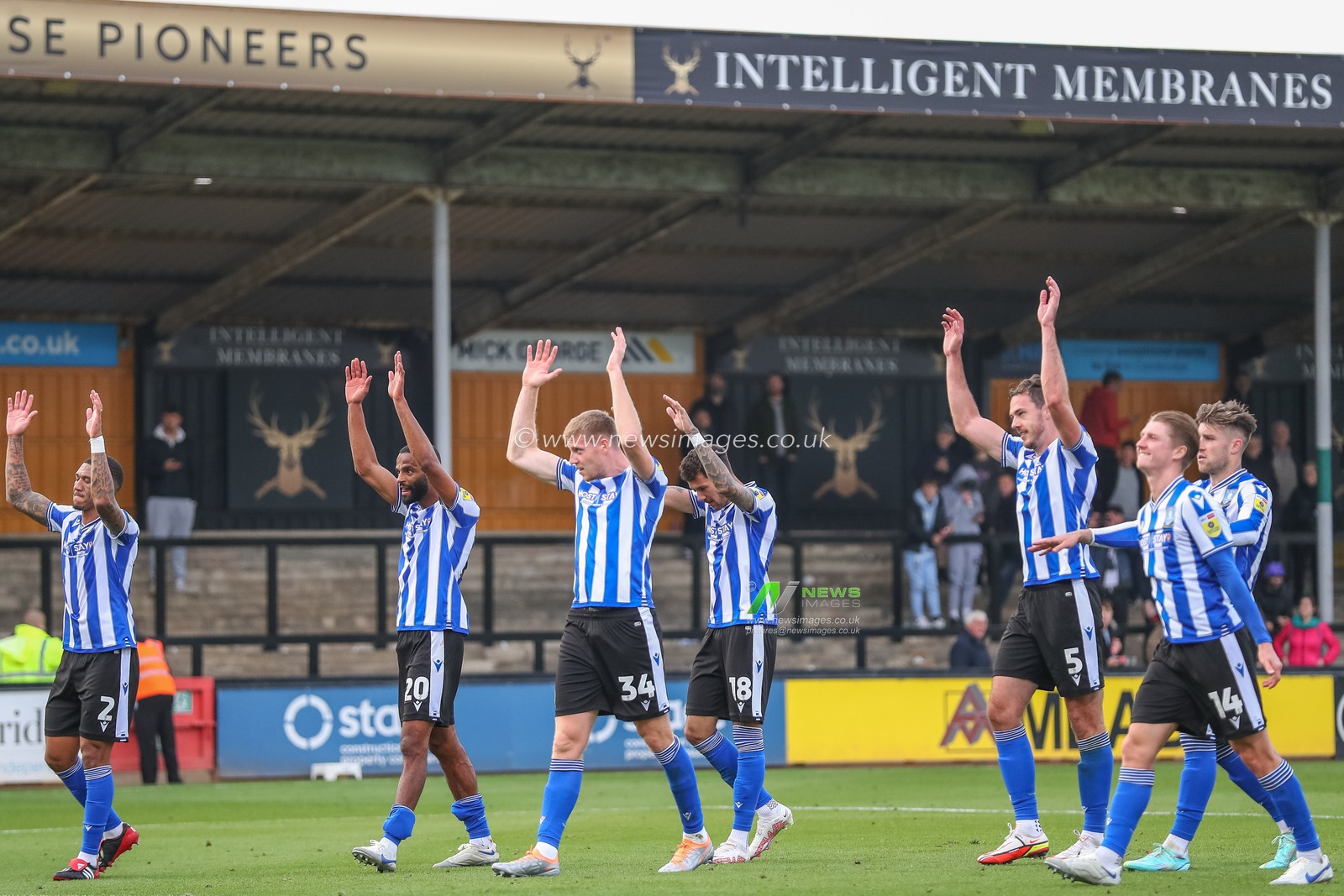 Sheffield Wednesday players celebrate their teams win after the Sky Bet League 1 match Cambridge United vs Sheffield Wednesday at Abbey Stadium, Cambridge, United Kingdom, 15th October 2022

(Photo by Gareth Evans/News Images)