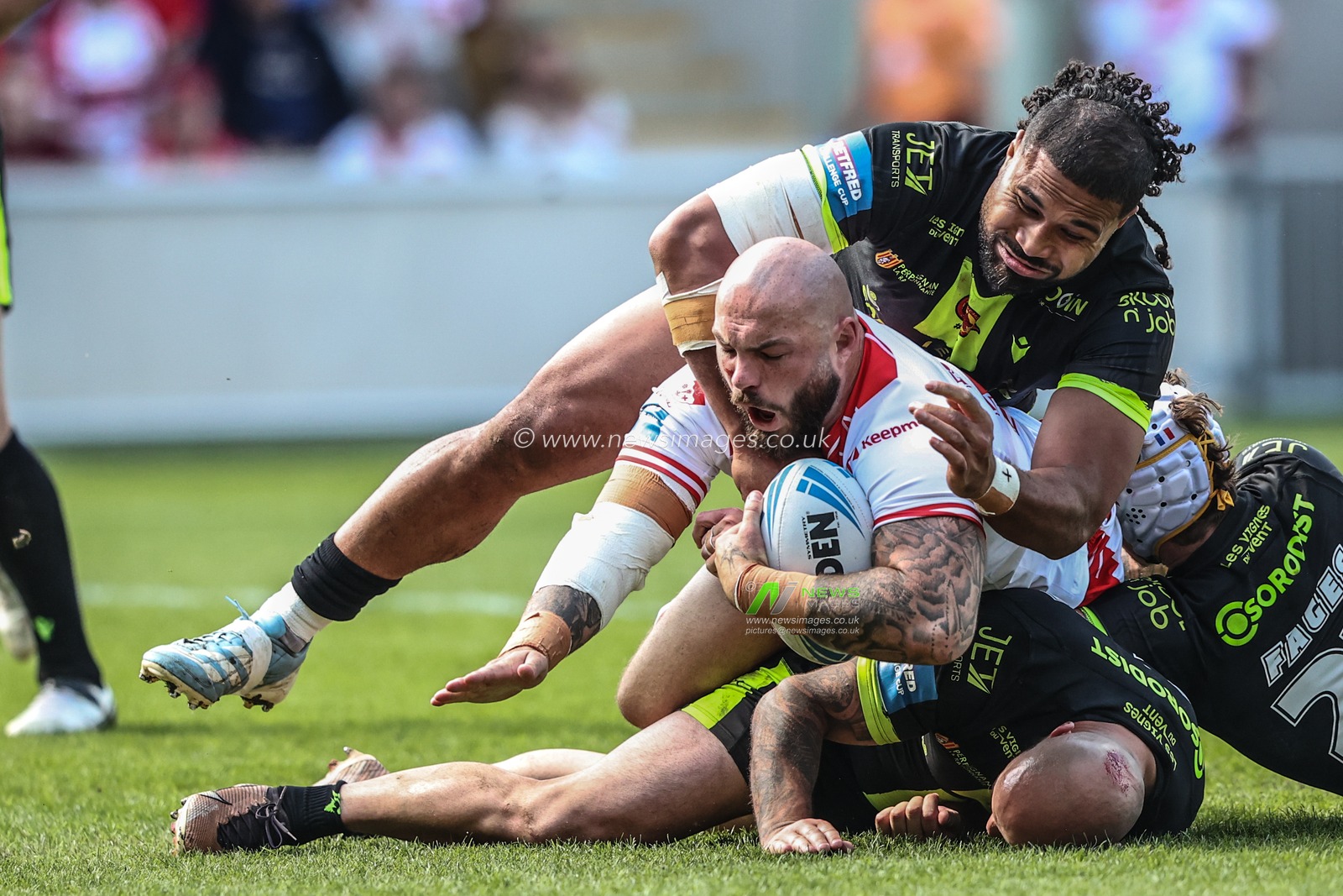 Sam Luckley of Hull KR is tackled during the Betfred Challenge Cup Semi-final match Hull KR vs Catalans Dragons at LNER Community Stadium, York, United Kingdom, 10th May 2025

(Photo by Alfie Cosgrove/News Images)
