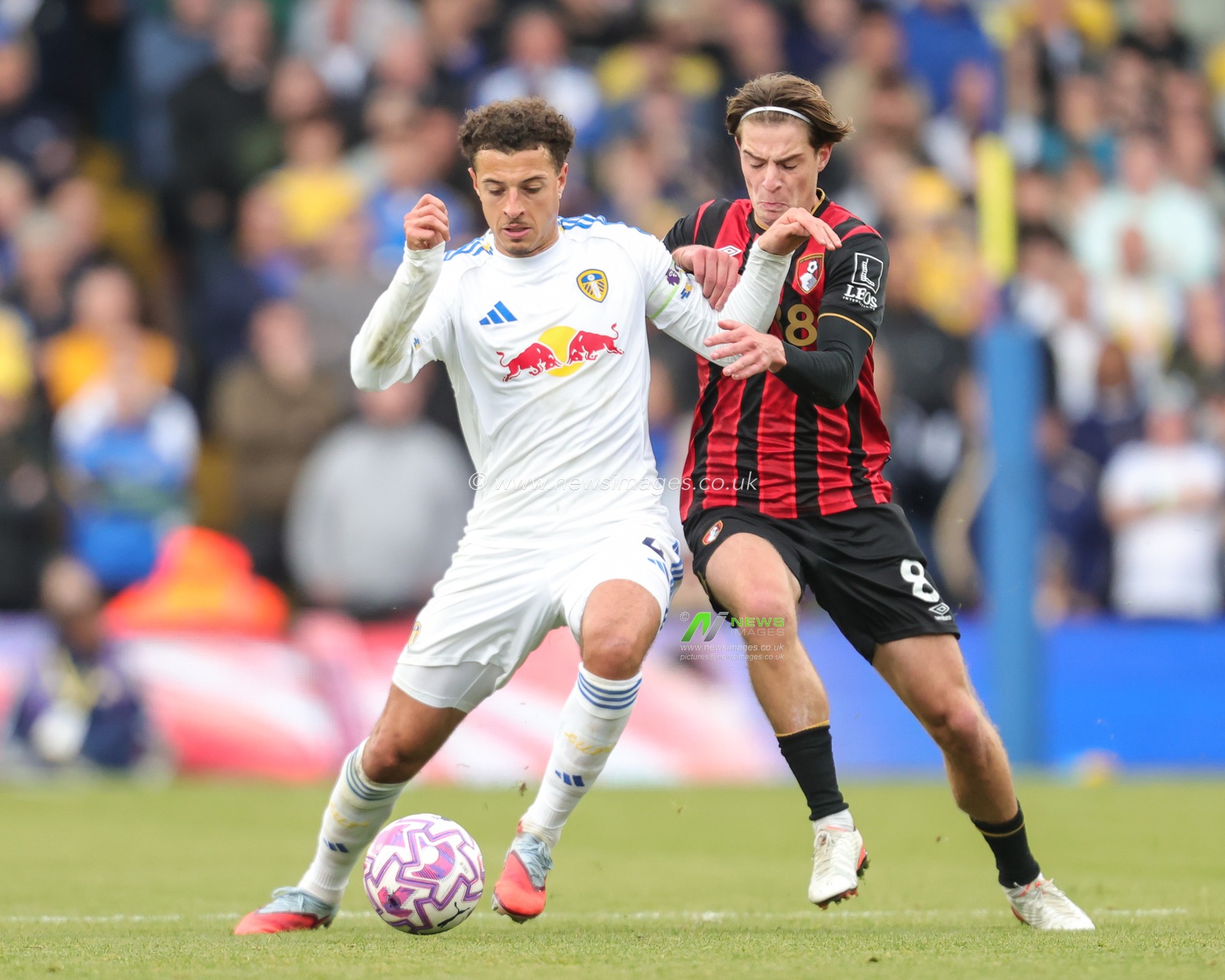 Ethan Ampadu of Leeds United and Alex Scott of Bournemouth battle for the ball during the Premier League match Leeds United vs Bournemouth at Elland Road, Leeds, United Kingdom, 27th September 2025

(Photo by Richard Bierton/News Images)