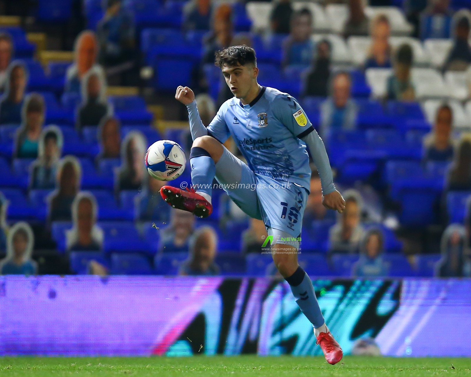 Ryan Giles #18 of Coventry City controls the ball in the air