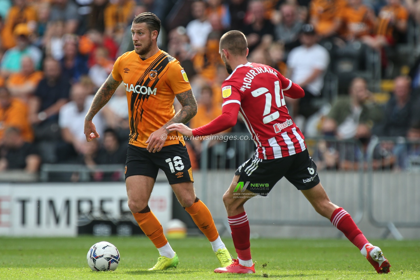George Moncur #18 of Hull City looks up to pass the ball