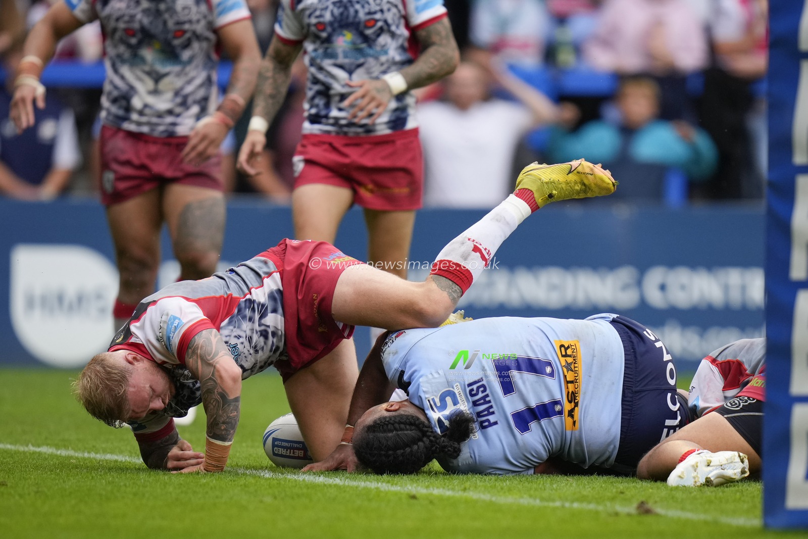 Oliver Holmes #16 of Leigh Leopards makes a try saving tackle on Agnatius Paasi #17 of St. Helens injuring the Saints player during the Betfred Challenge Cup Semi-Final match Leigh Leopards vs St Helens at Halliwell Jones Stadium, Warrington, United Kingdom, 22nd July 2023

(Photo by Steve Flynn/News Images)