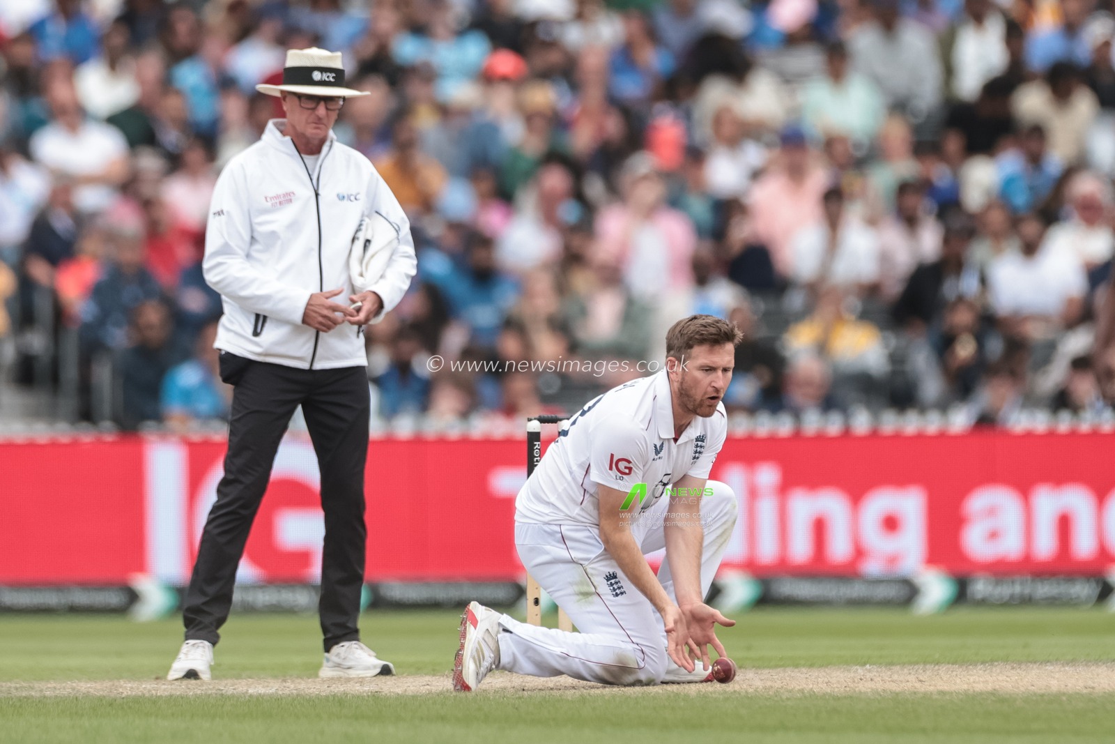 Liam Dawson of England fields his own ball off Ravindra Jadeja of India during the 4th Rothesay Test Match Day 5 England vs India at Old Trafford Cricket Ground, Manchester, United Kingdom, 27th July 2025

(Photo by Mark Cosgrove/News Images)