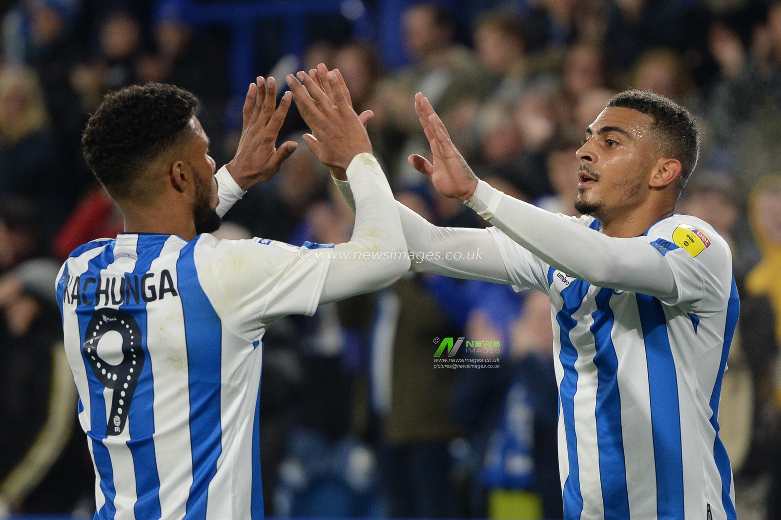 26th November 2019, John Smith's Stadium, Huddersfield, England; Sky Bet Championship, Huddersfield Town v Swansea City : Elias Kachunga (9) and Karlan Grant (16) of Huddersfield Town celebrate equaling goal to make it 1-1.

Credit: Dean Williams/News Images