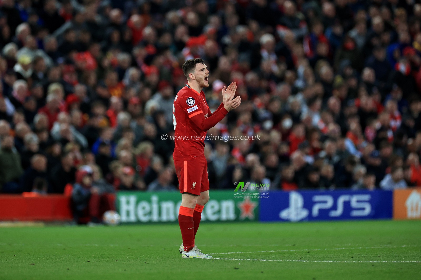 Andrew Robertson #26 of Liverpool applauds his team mates