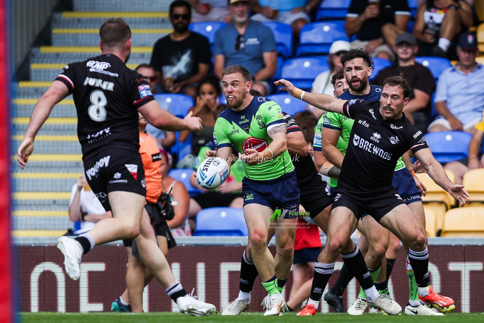 Matt Dufty of Warrington Wolves passes the ball during the Betfred Super League Round 21 match London Broncos vs Warrington Wolves at Plough Lane, Wimbledon, United Kingdom, 11th August 2024

(Photo by Izzy Poles/News Images)