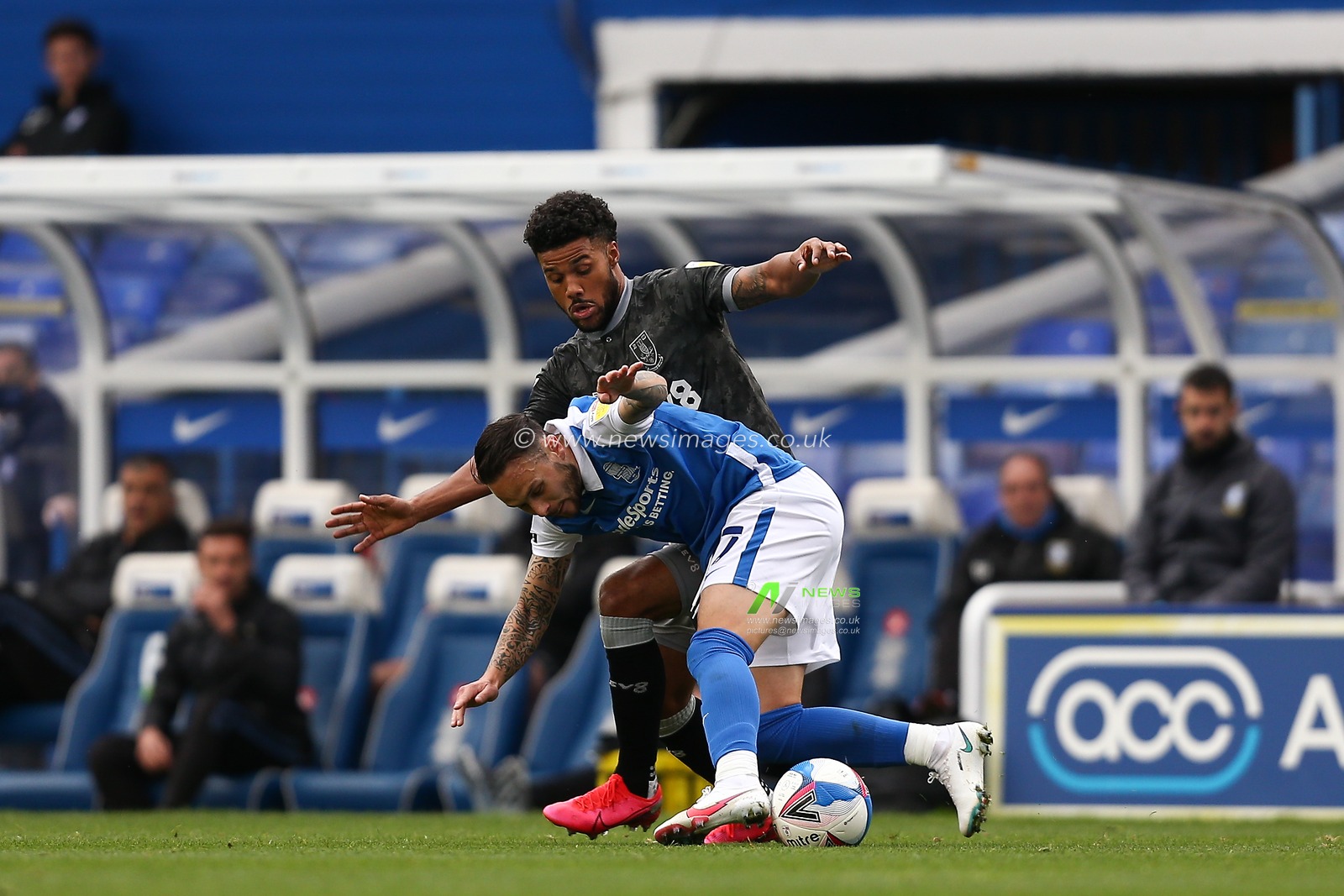 Ivan Sanchez (17) of Birmingham City is fouled by Elias Kachunga (45) of Sheffield Wednesday