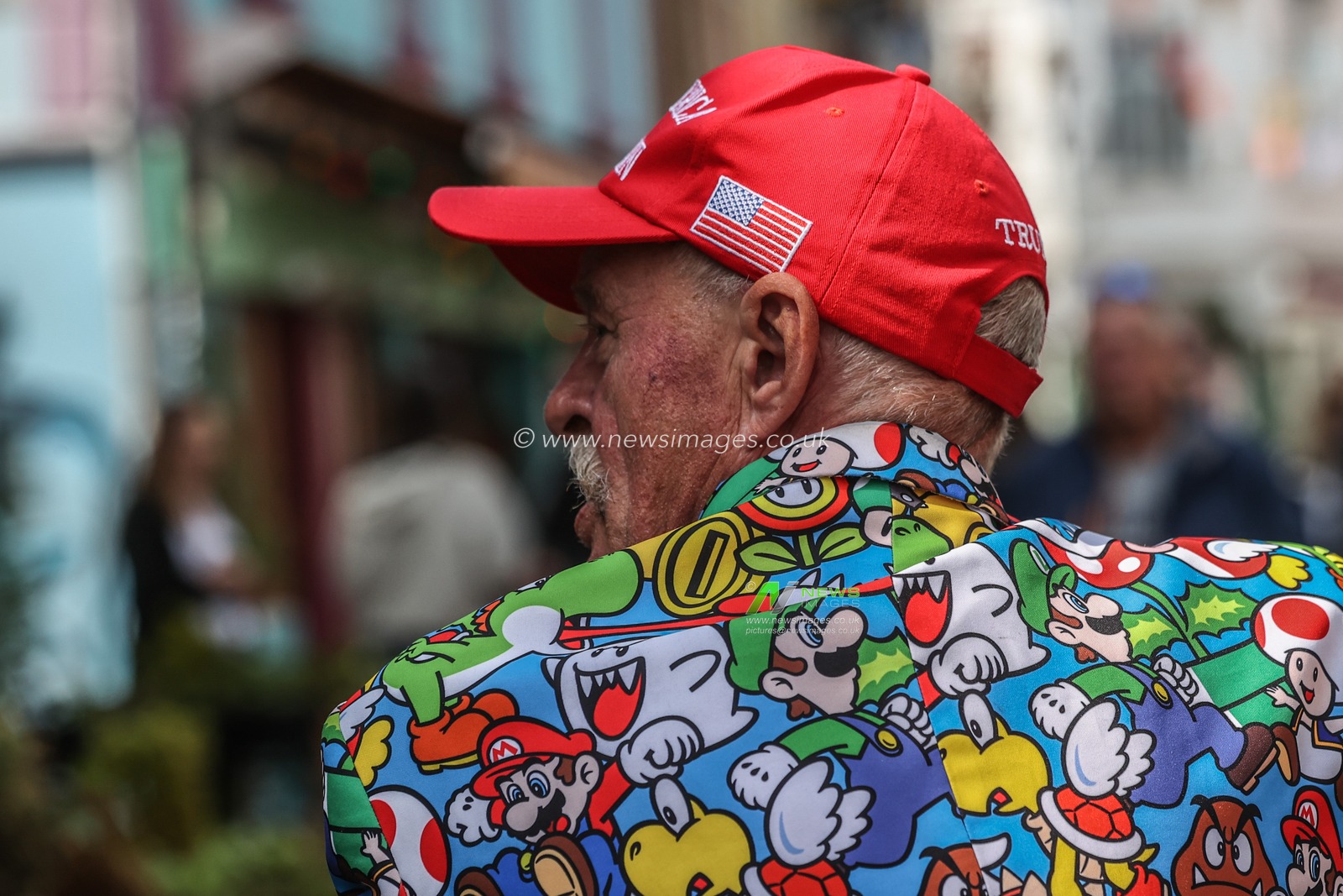 A President Donald trump supporter walks through the streets of Stavanger wearing a Nintendo Mario & Luigi jacket and a red hat with Make America Great Again on , Rogaland, Norway, 9th June 2025

(Photo by Alfie Cosgrove/News Images)