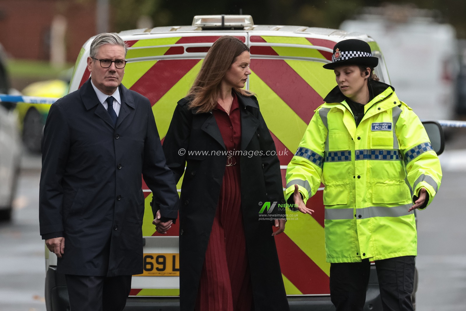Sir Keir Starmer, Prime Minister of the United Kingdom of Great Britain and Northern Ireland and his wife Victoria, Lady Starmer are escorted by a police officer as the leave the scene during the Manchester synagogue terror attack day 2 at Heaton Park Shul, Manchester, United Kingdom, 3rd October 2025

(Photo by Mark Cosgrove/News Images)