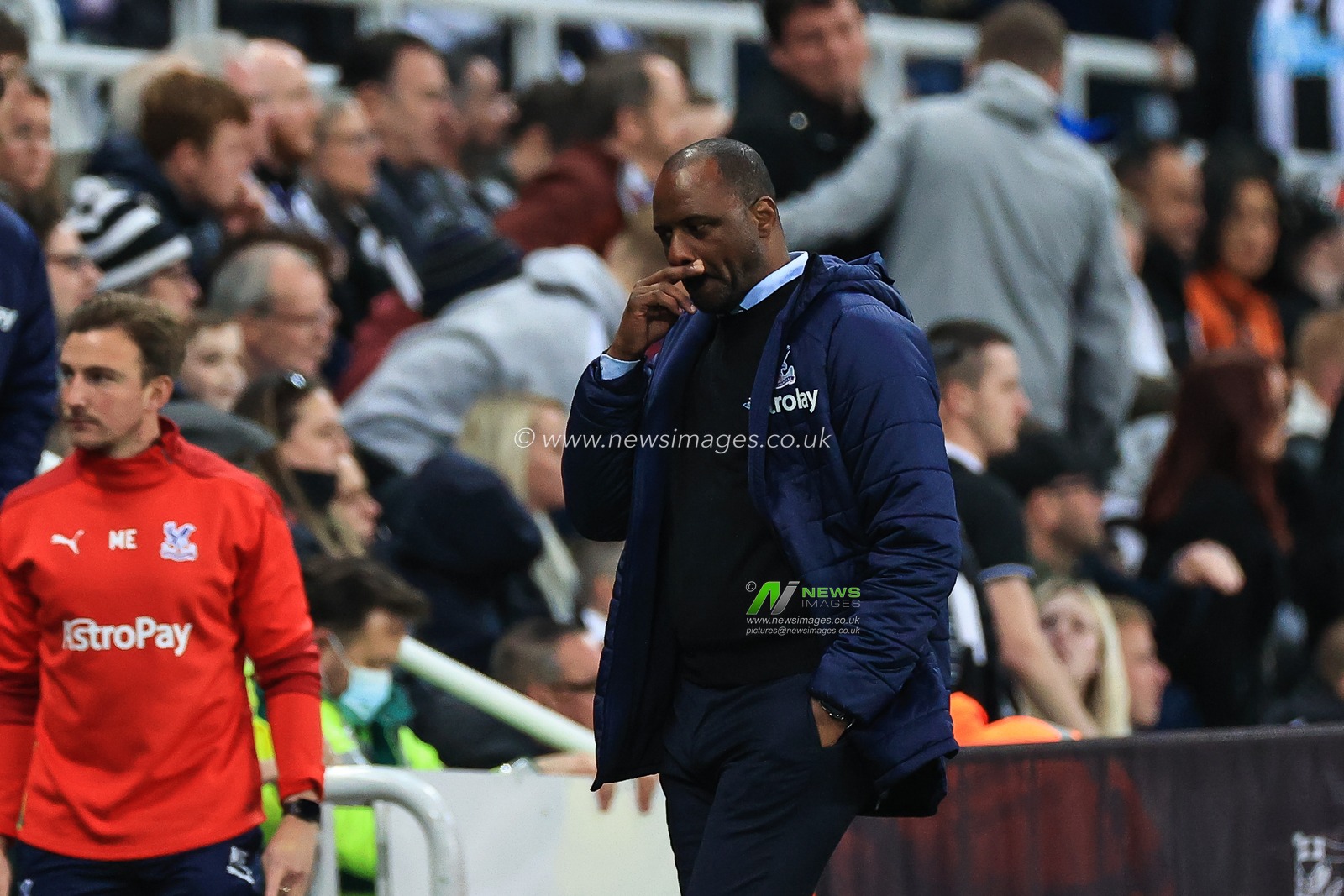 Patrick Vieria manager of Crystal Palace makes his way to the dressing room at half time