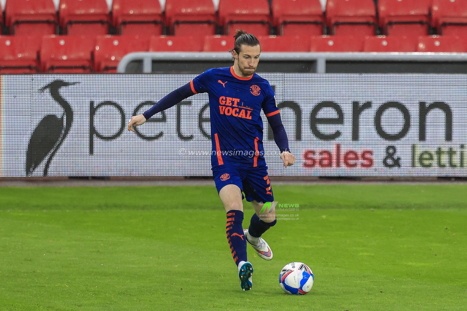 James Husband #3 of Blackpool in possession of the ball