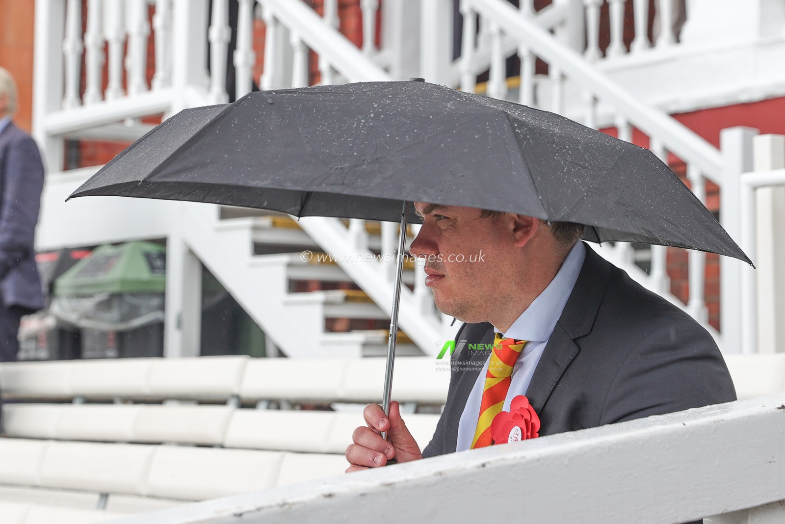 Marylebone Cricket Club member gets out their umbrella as it starts to rain during the LV= Insurance Ashes Test Series Second Test Day 2 England v Australia at Lords, London, United Kingdom, 29th June 2023

(Photo by Mark Cosgrove/News Images)