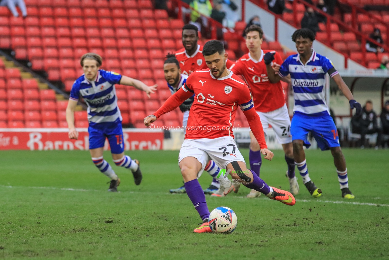 Alex Mowatt #27 of Barnsley scores a penalty to make it 1-1