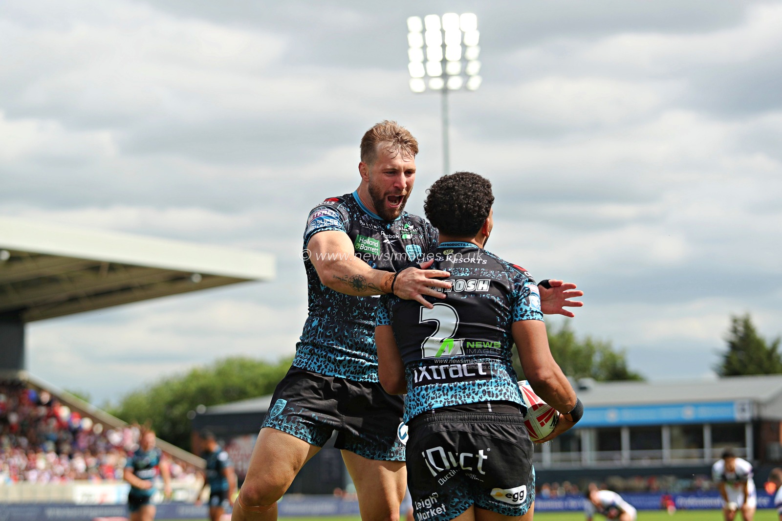 Darnell McIntosh of Leigh Leopards celebrates his try during  the Betfred Super League Round 14 match Wakefield Trinity vs Leigh Leopards at DIY Kitchens Stadium, Wakefield, United Kingdom, 15th June 2025(Photo by Sam Eaden/News Images)