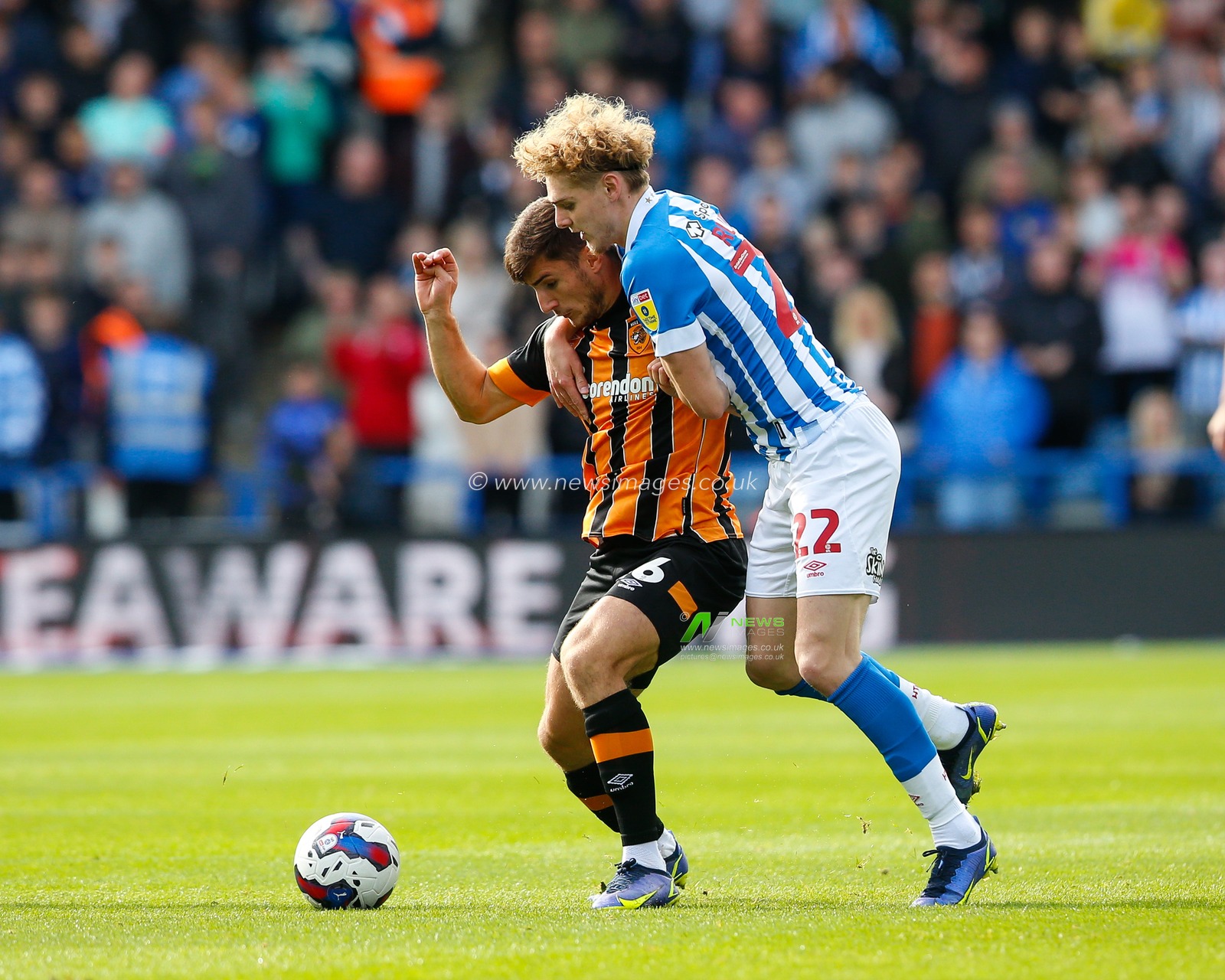 Jack Rudoni #22 of Huddersfield Town and Ryan Longman #16 of Hull City during the Sky Bet Championship match Huddersfield Town vs Hull City at John Smith's Stadium, Huddersfield, United Kingdom, 9th October 2022

(Photo by Ben Early/News Images)