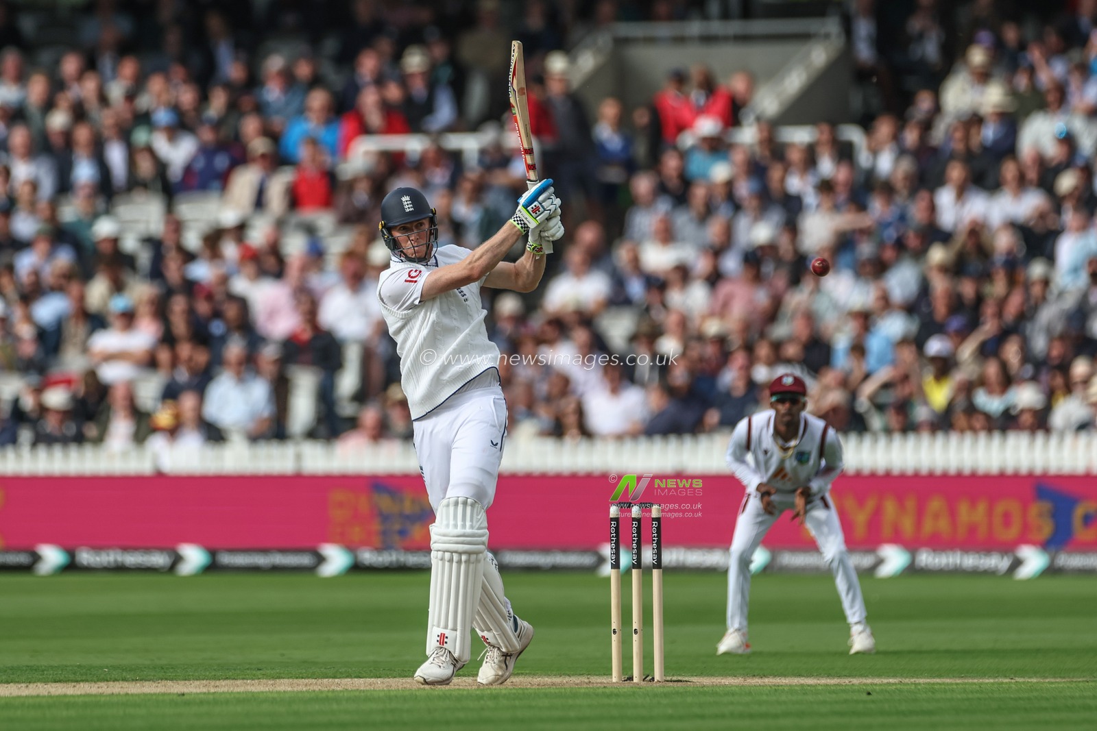 Zak Crawley of England hits the ball for four runs and notches up his half century (50 runs) during the 1st Rothesay Test Match day 1 England v West Indies at Lords, London, United Kingdom, 10th July 2024

(Photo by Mark Cosgrove/News Images)