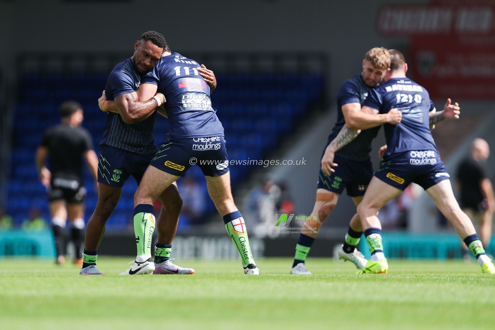 Warrington Wolves players warm up prior to the Betfred Super League Round 21 match London Broncos vs Warrington Wolves at Plough Lane, Wimbledon, United Kingdom, 11th August 2024

(Photo by Izzy Poles/News Images)