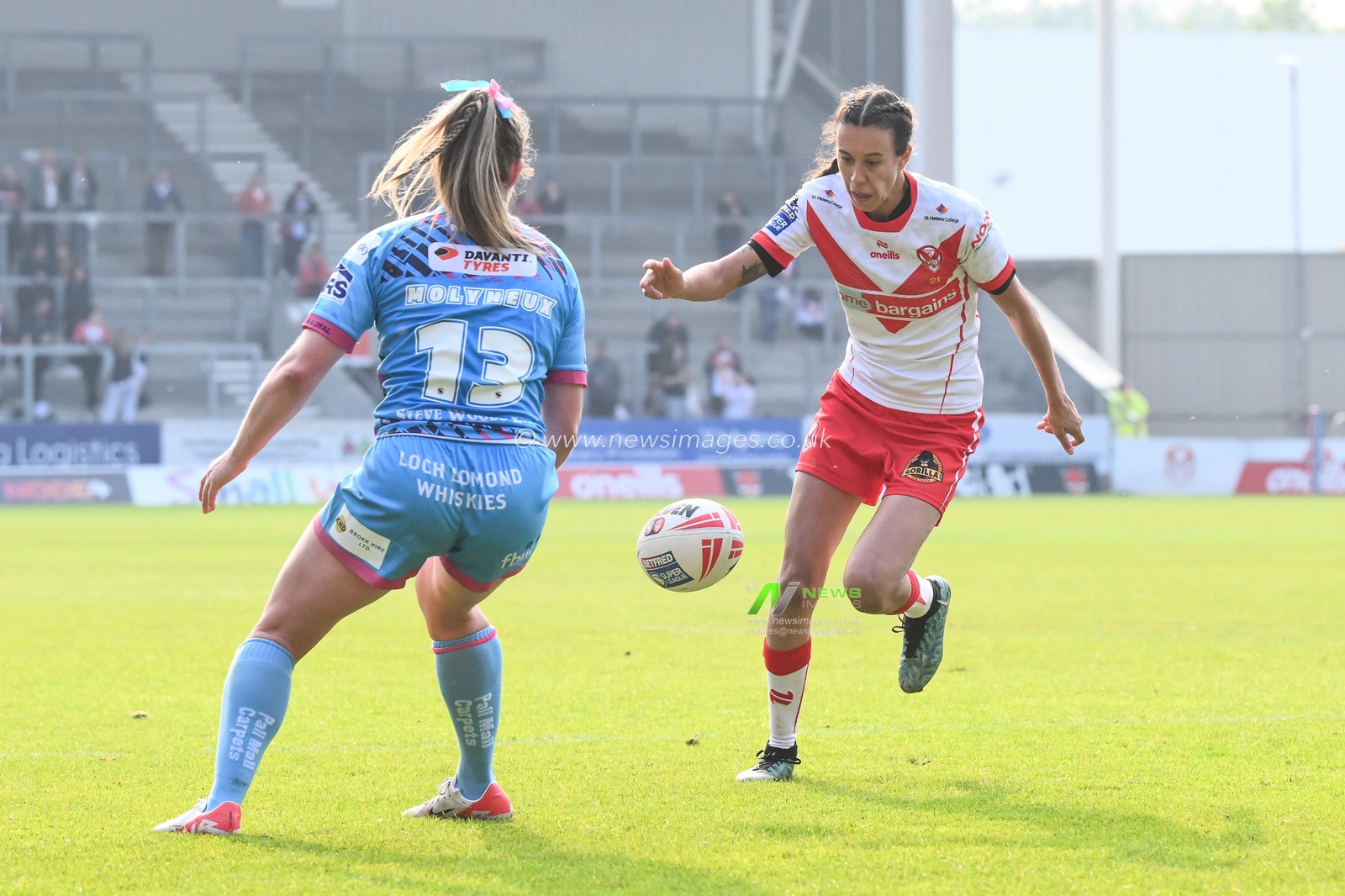 Zoe Harris of St Helens kicks ahead during the Betfred Women's Super League match St Helens vs Wigan Warriors at Totally Wicked Stadium, St Helens, United Kingdom, 31st May 2024

(Photo by Craig Thomas/News Images)