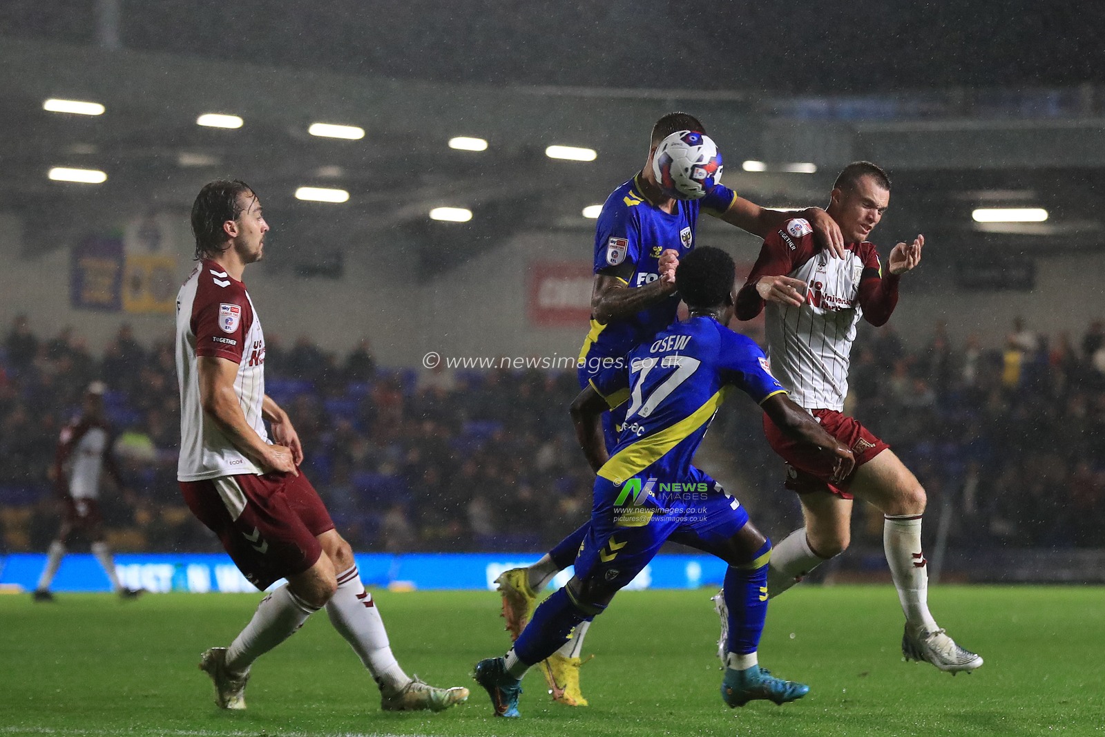 Harry Pell #8 of AFC Wimbledon and Marc Leonard #12 of Northampton Town compete for a ball during the Sky Bet League 2 match AFC Wimbledon vs Northampton Town at Cherry Red Records Stadium, Merton, United Kingdom, 13th September 2022

(Photo by Carlton Myrie/News Images)