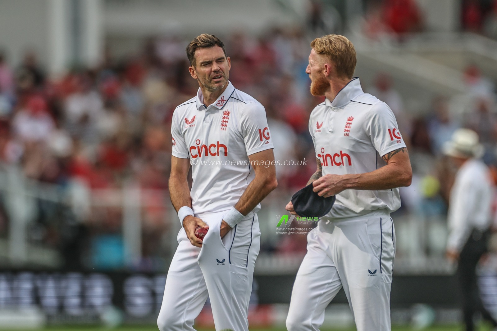 James Anderson of England speaks to Ben Stokes of England as he polishes the ball during the Rothesay Test Match Day Two England v West Indies at Lords, London, United Kingdom, 11th July 2024

(Photo by Mark Cosgrove/News Images)