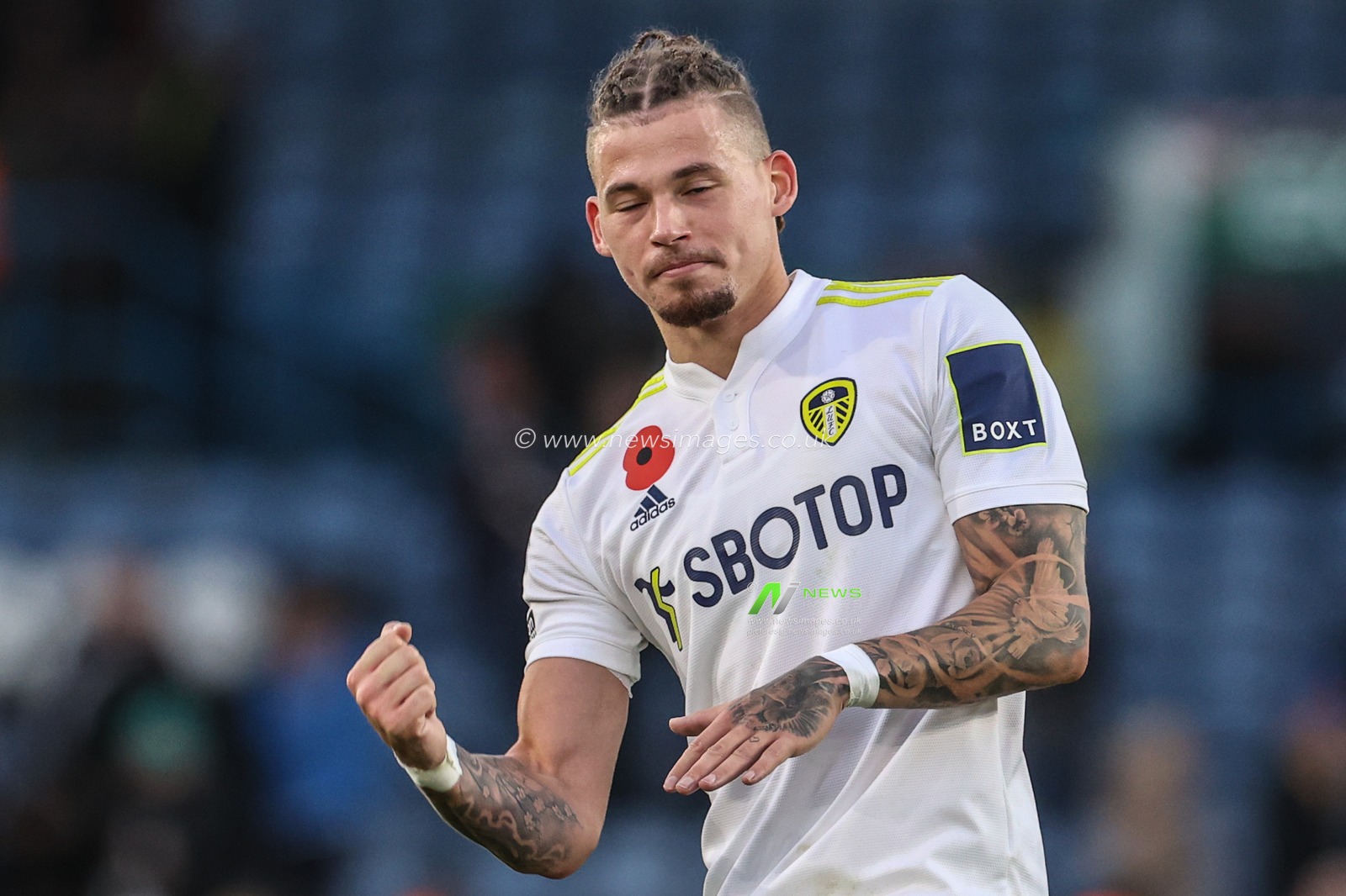 Kalvin Phillips #23 of Leeds United punches the air as he plays to the fans