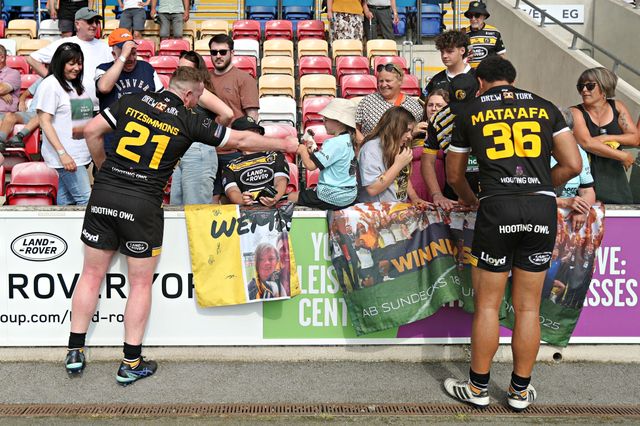 Connor Fitzsimmons of York Knights RLFC and Toa Mata'Afa of York Knights RLFC celebrate with fans after the Betfred Championship match York City Knights vs Featherstone Rovers at LNER Community Stadium, York, United Kingdom, 29th June 2025(Photo by Sam Eaden/News Images)