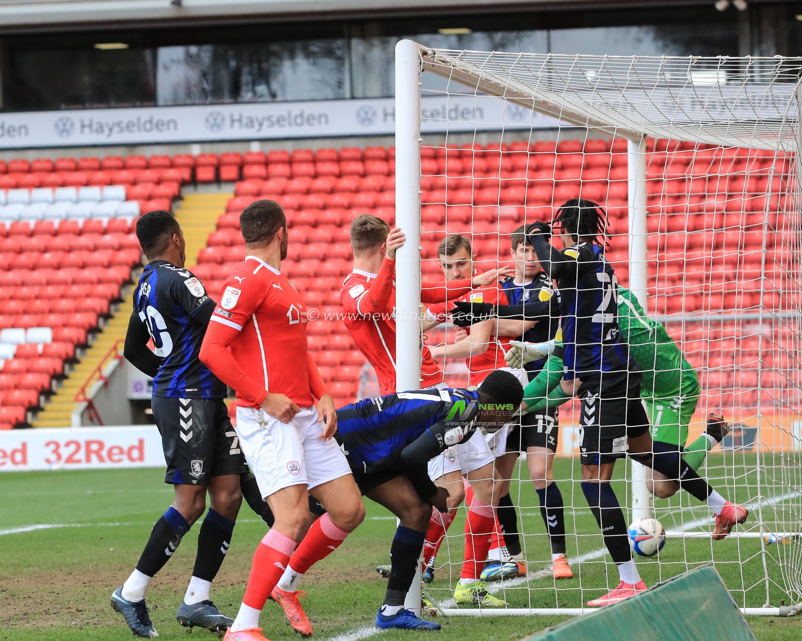 Alex Mowatt #27 of Barnsley scored direct from a corner to make it 1-0