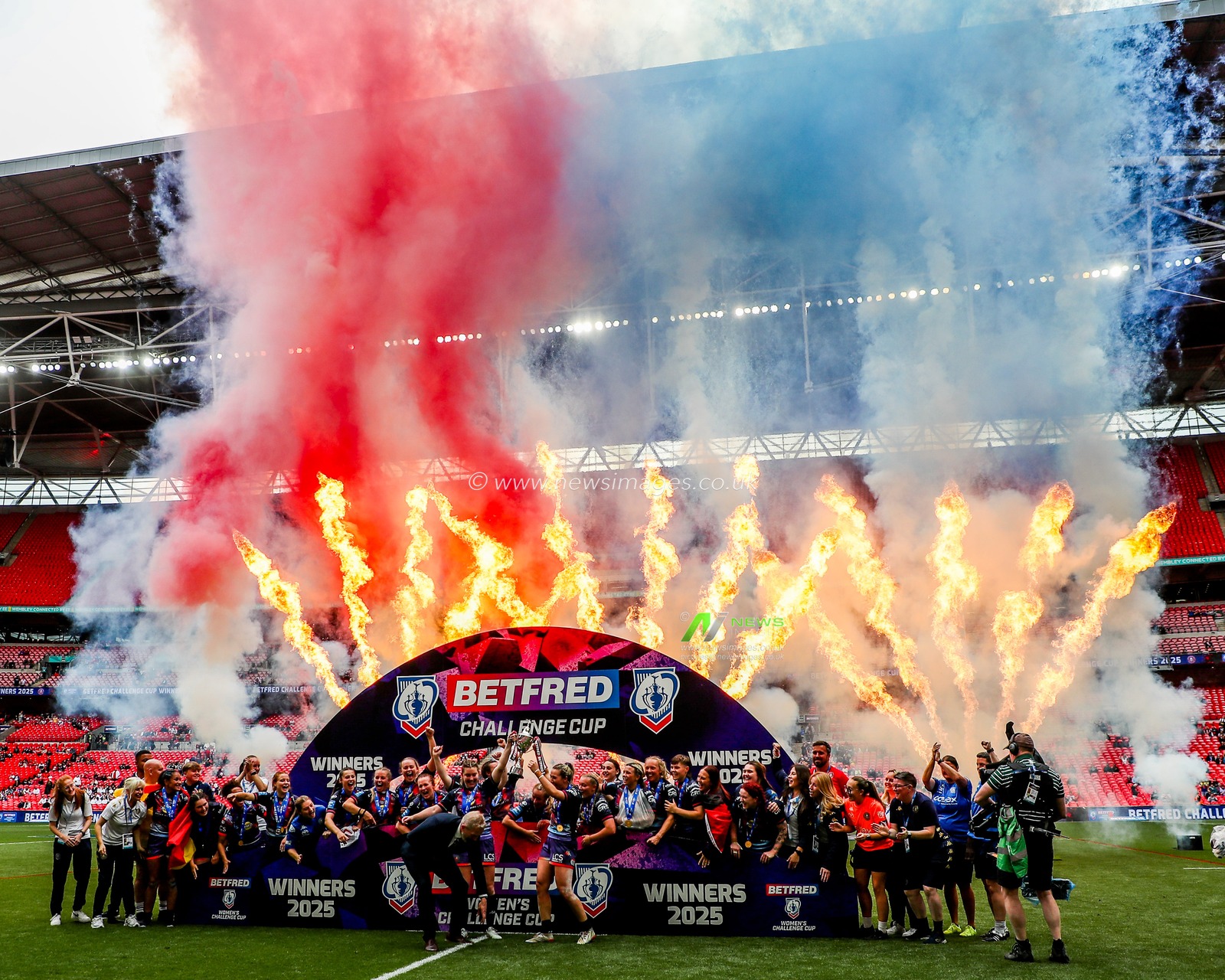 Wigan Warriors lift the Challenge Cup after the teams victory following the Betfred Women's Challenge Cup Final St Helens vs Wigan Warriors at Wembley Stadium, London, United Kingdom, 7th June 2025

(Photo by Izzy Poles/News Images)