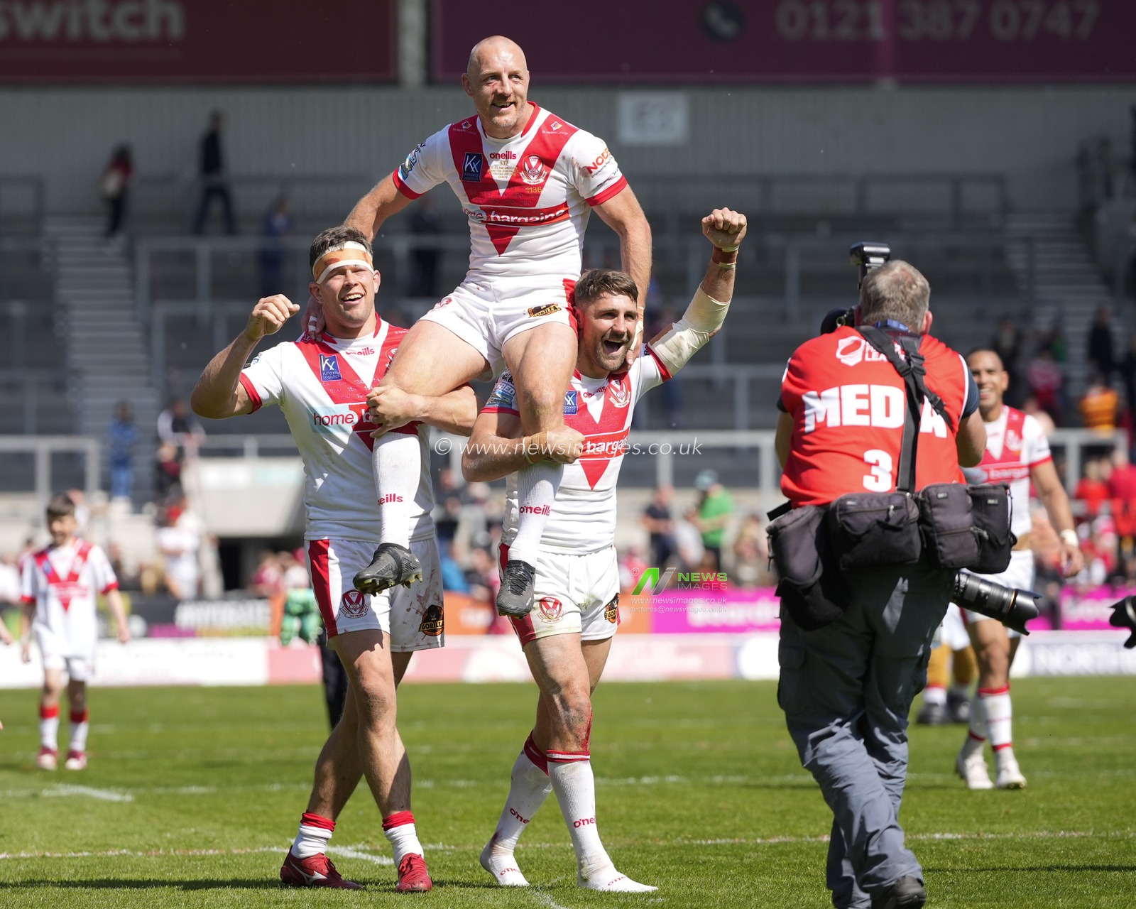 Louie McCarthy-Scarsbrook #15 and Tommy Makinson #2 carry James Roby #9 of St. Helens on their shoulders after he played his 532â€™nd game for the club, both a Saints and Super League record during the Betfred Super League Round 12 match St Helens vs Salford Red Devils at Totally Wicked Stadium, St Helens, United Kingdom, 13th May 2023

(Photo by Steve Flynn/News Images)