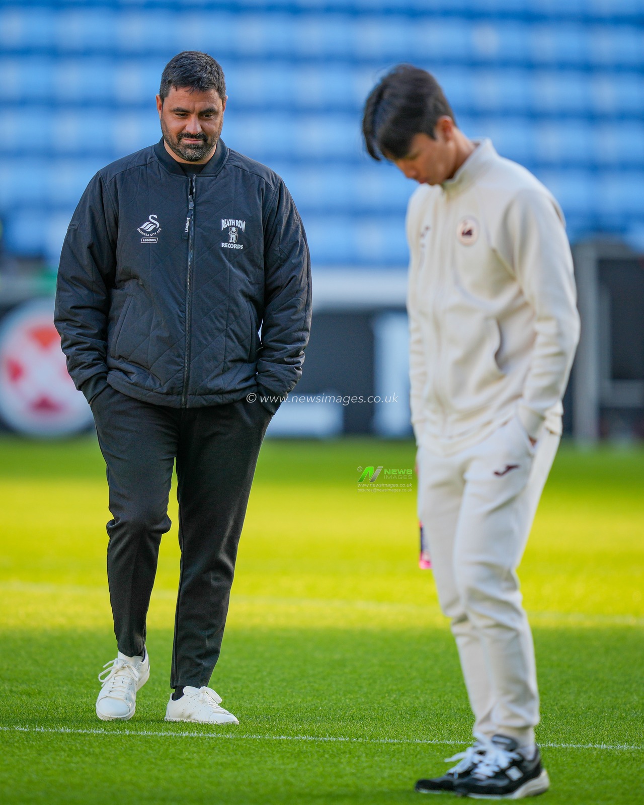 Swansea City Manager Vítor Matos inspects the pitch during the Sky Bet Championship match Coventry City vs Swansea City at Coventry Building Society Arena, Coventry, United Kingdom, 26th December 2025

(Photo by Maynard Manyowa/News Images)

*** GER AUT SUI OUT ***