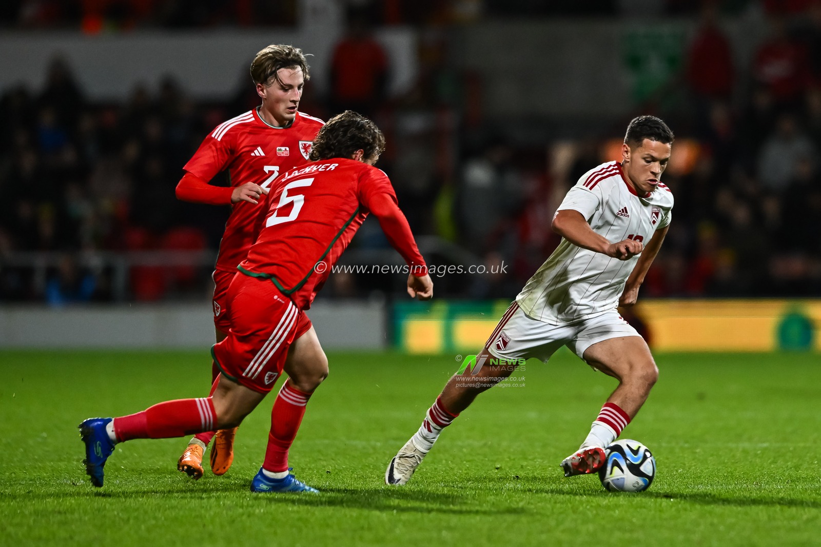 Tjay De Barr of Gibraltar makes a break with the ball  during the International Friendly match Wales vs Gibraltar at SToK Cae Ras, Wrexham, United Kingdom, 11th October 2023

(Photo by Craig Thomas/News Images)