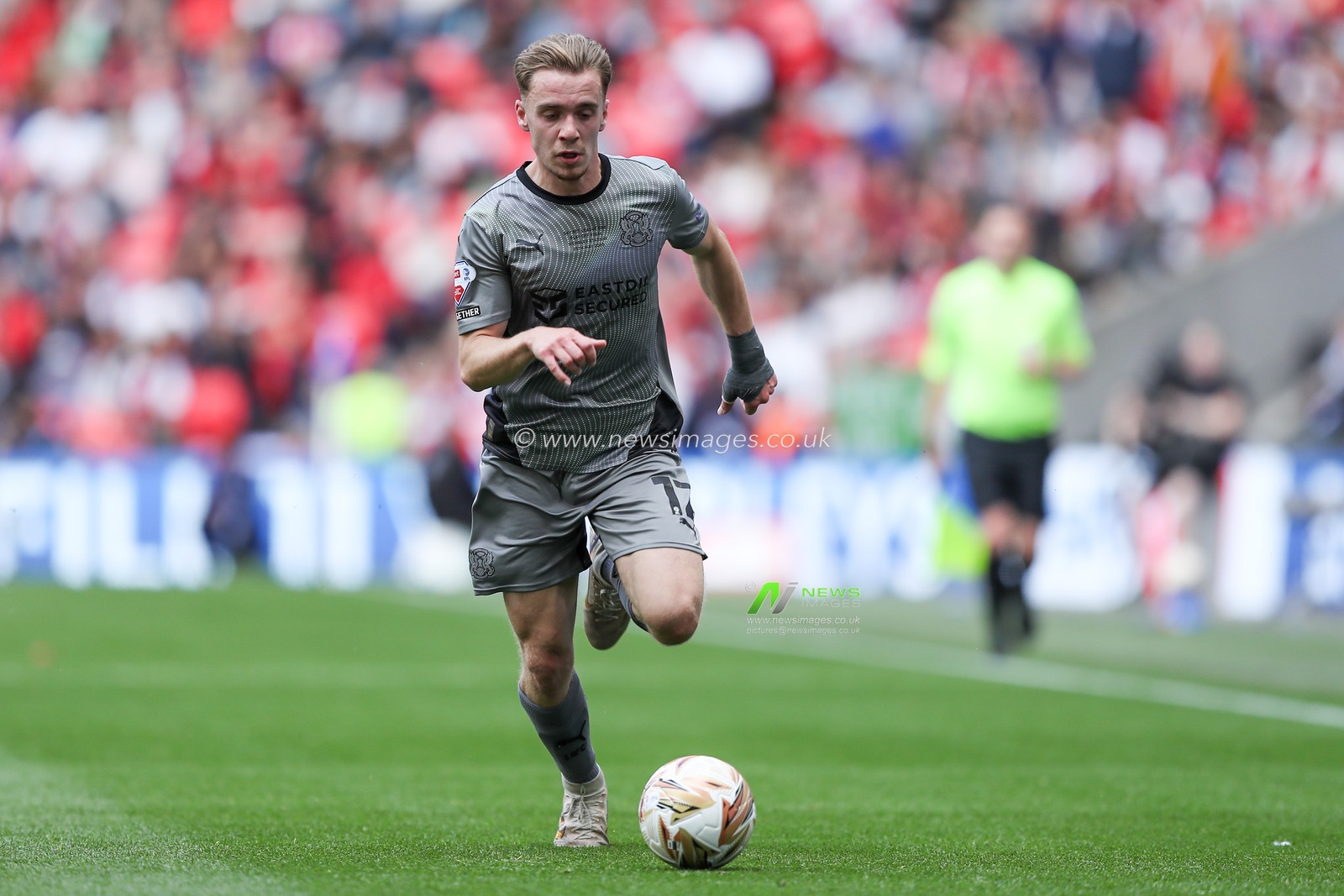 Jack Currie of Leyton Orient with ball at his feet during the Sky Bet League 1 Playoff Final match Charlton Athletic vs Leyton Orient at Wembley Stadium, London, United Kingdom, 25th May 2025

(Photo by Jorge Horsted/News Images)